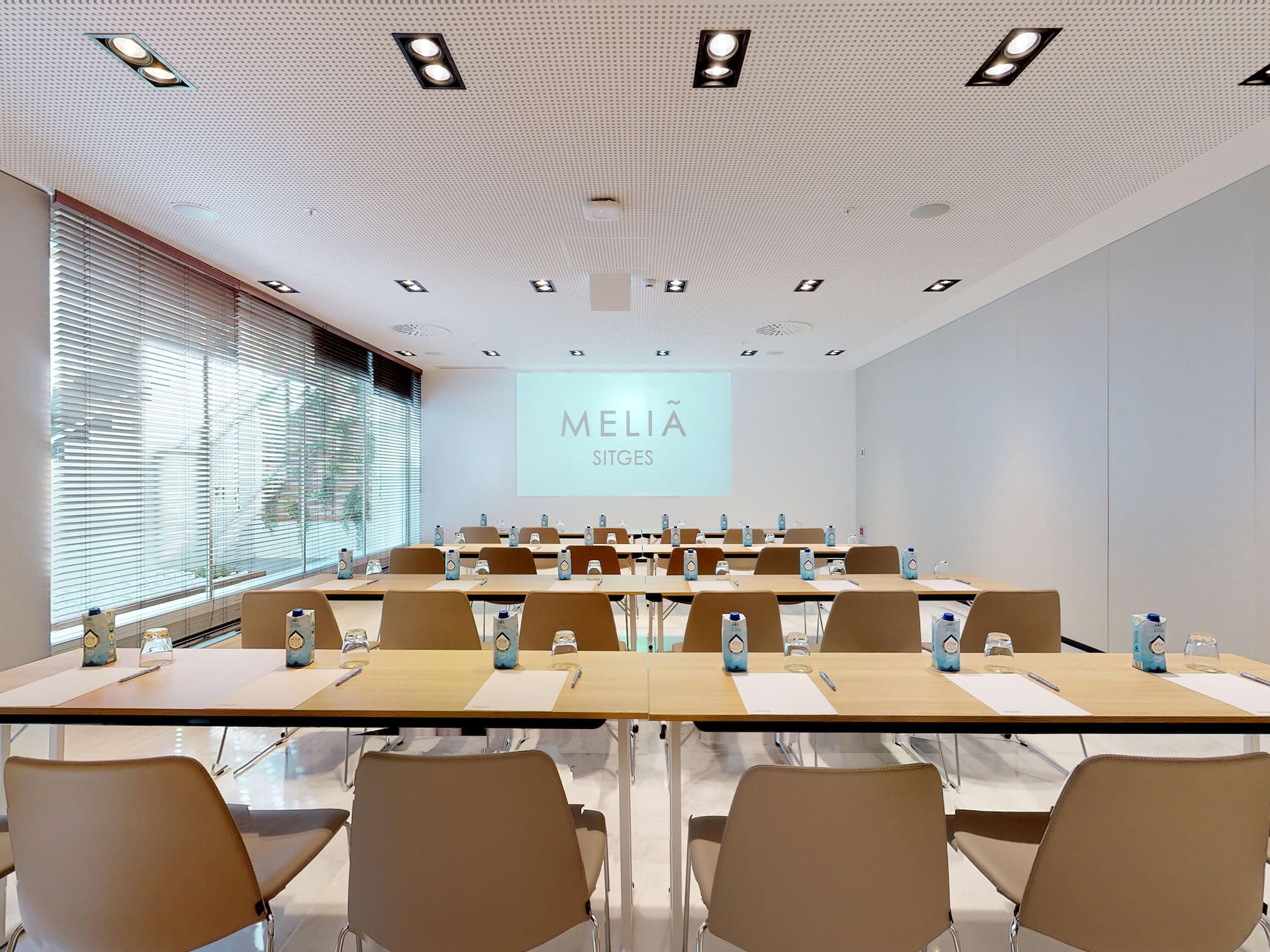 a room with tables and chairs