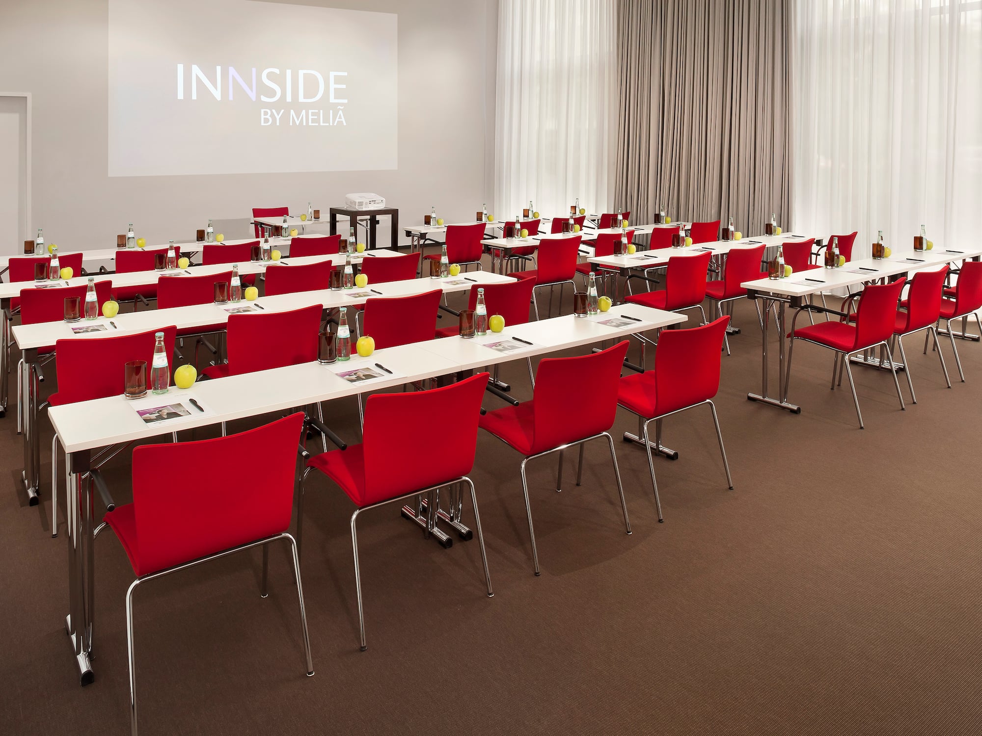 a room with tables and chairs