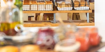 a shelf of bread and pastries