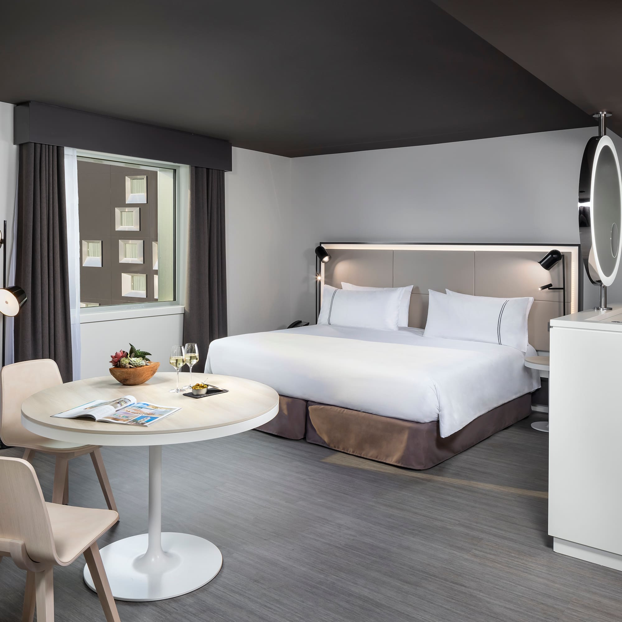 a room with a bed and a table