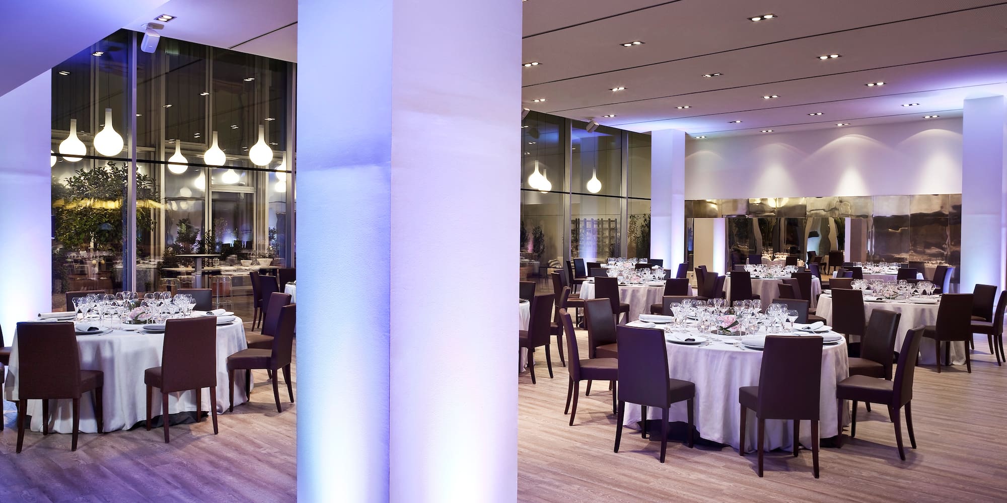 a room with tables and chairs