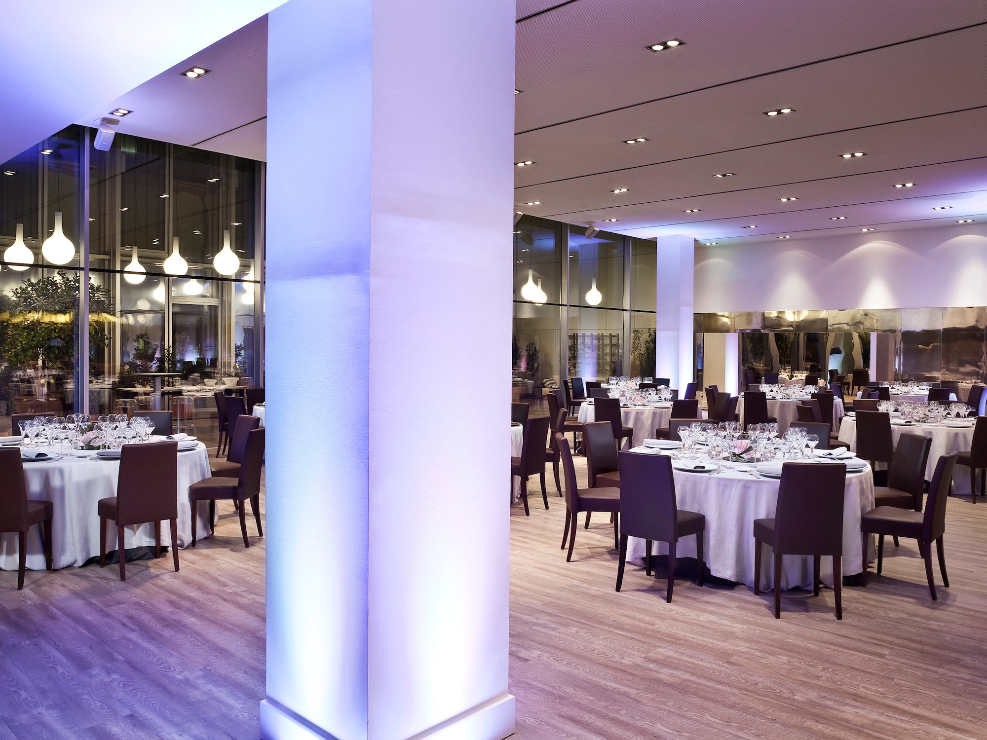 a room with tables and chairs