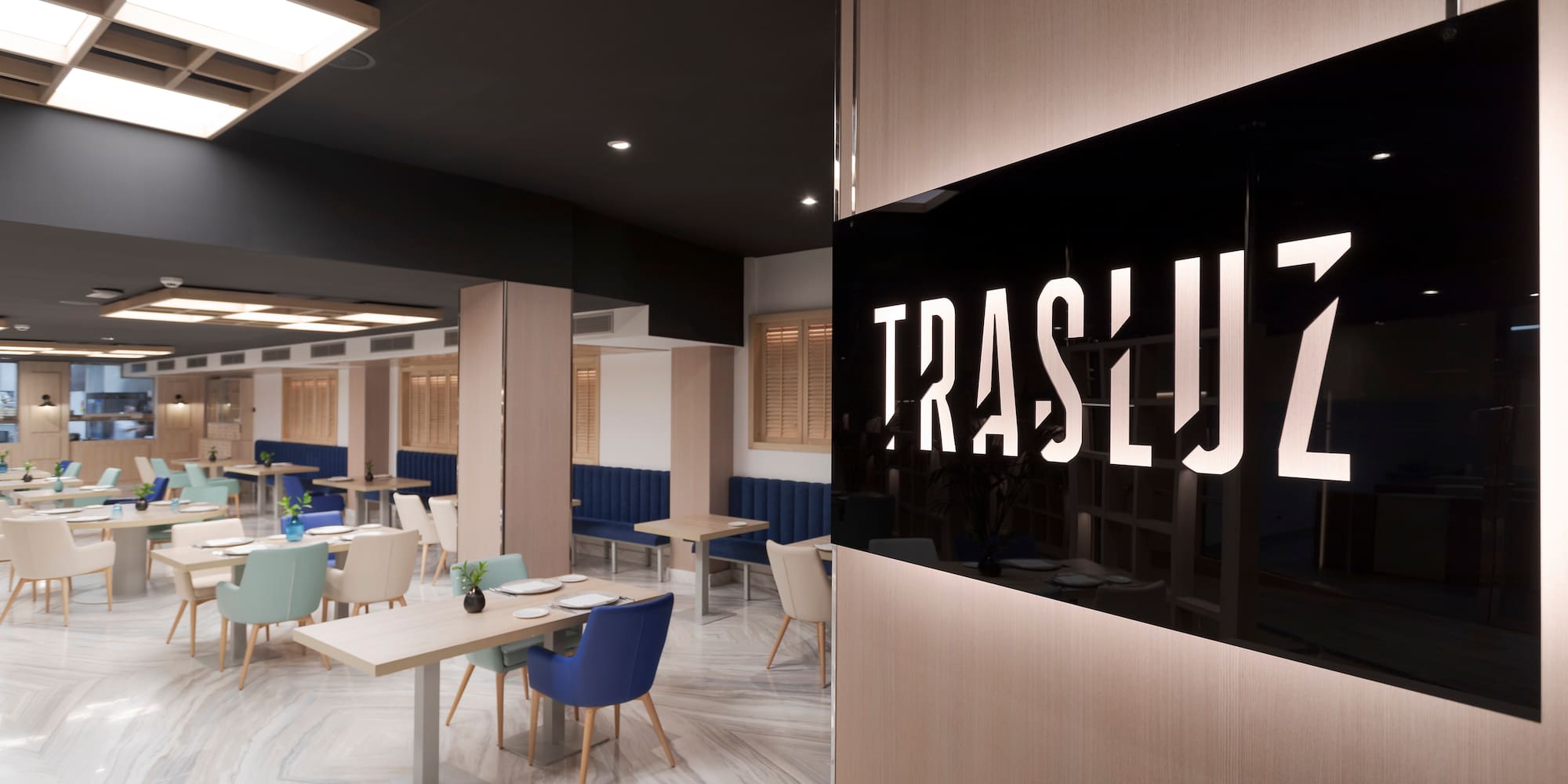 a restaurant with tables and chairs