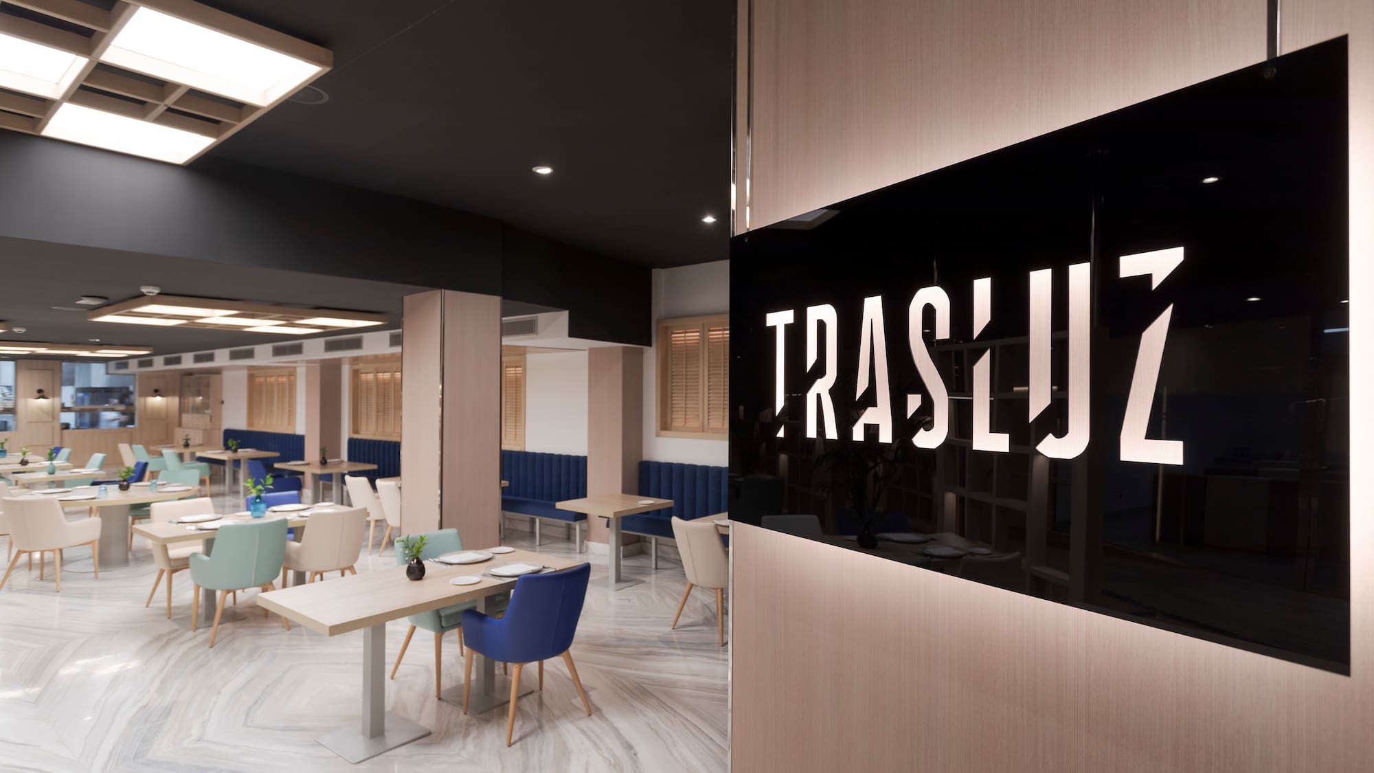 a restaurant with tables and chairs