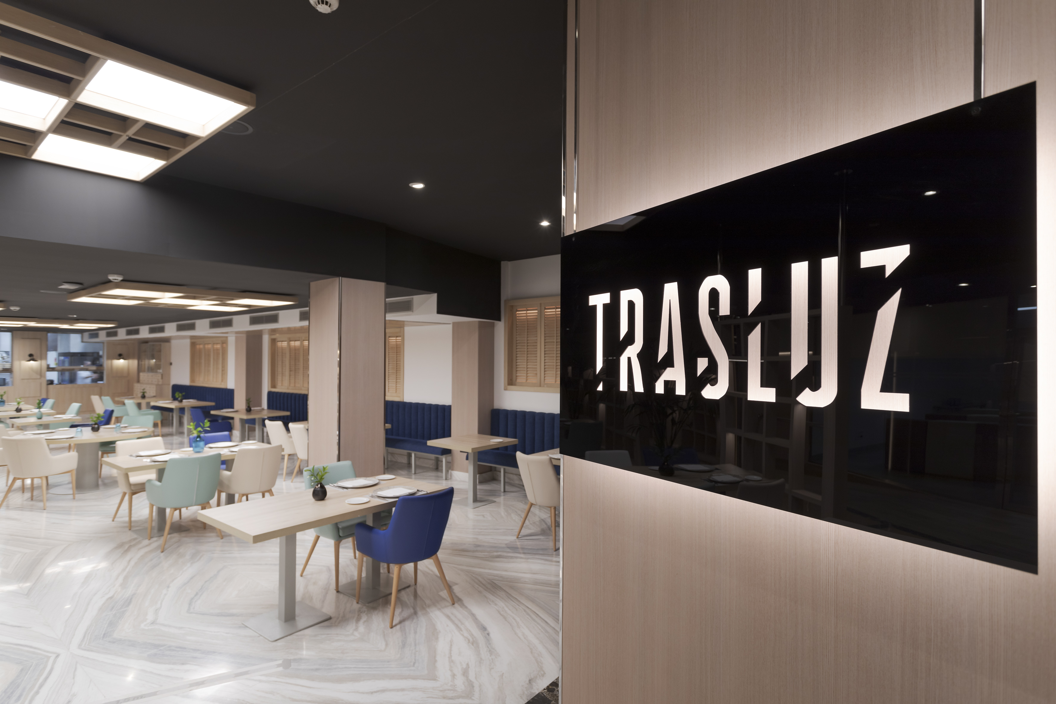 a restaurant with tables and chairs