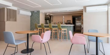 a room with tables and chairs