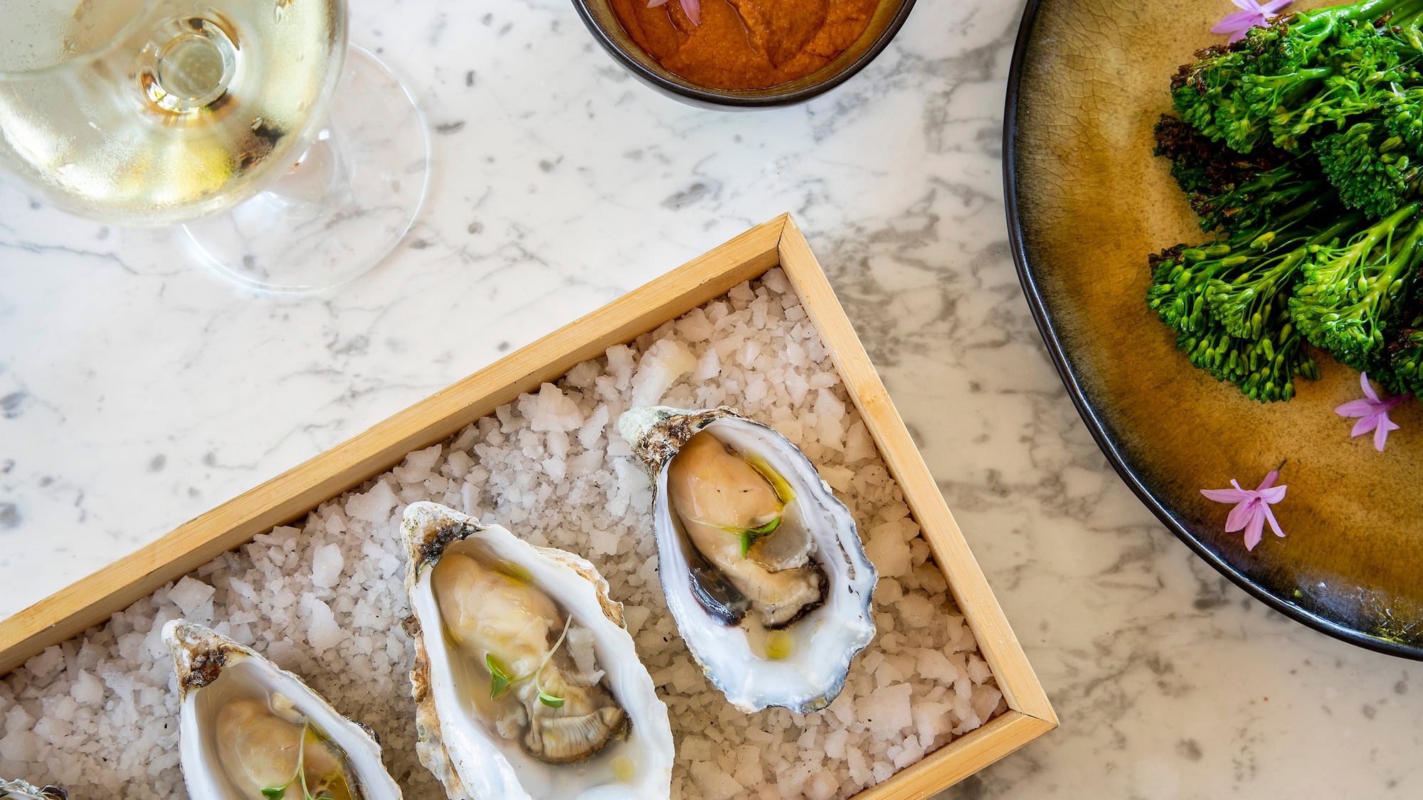 a plate of food on a marble table