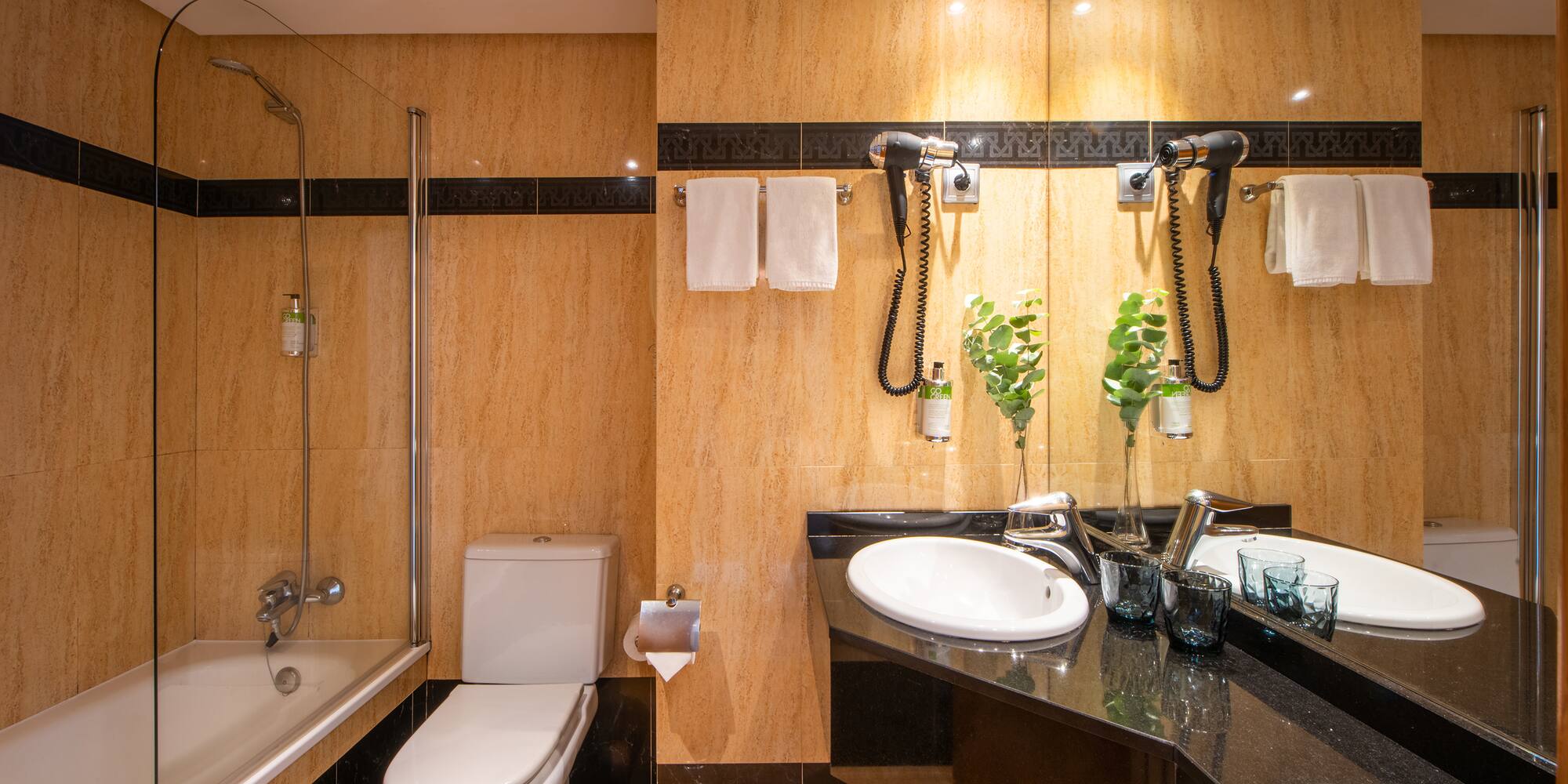 a bathroom with a sink and shower