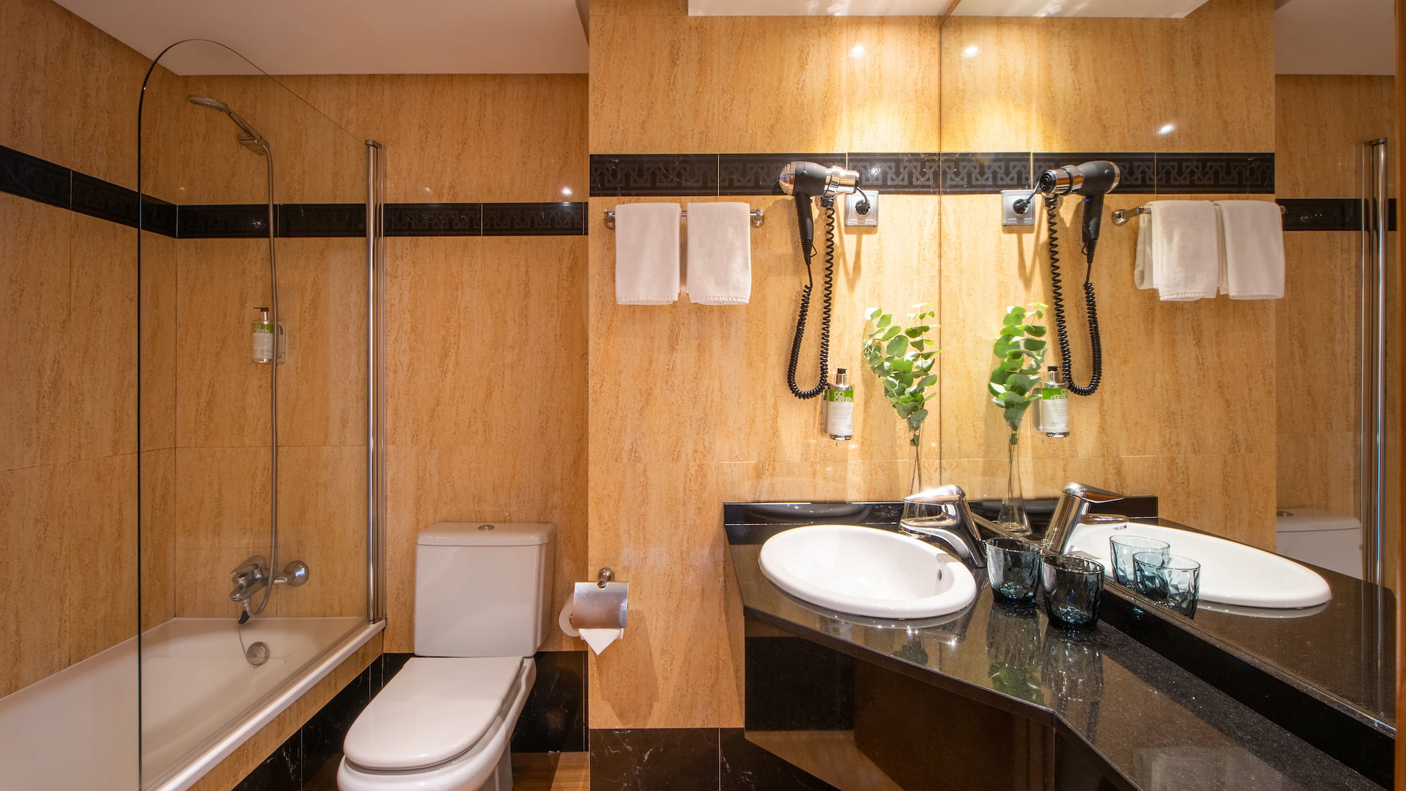 a bathroom with a sink and shower
