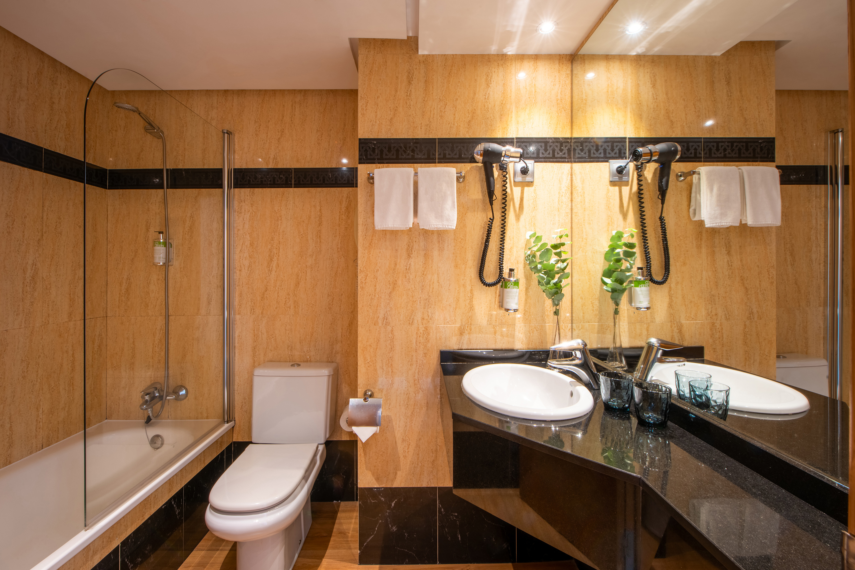a bathroom with a sink and shower