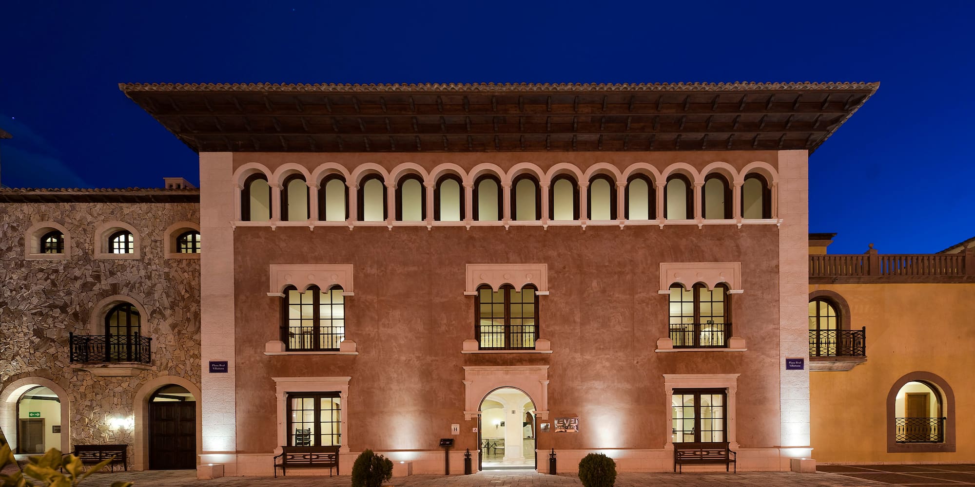 a building with lights on the outside