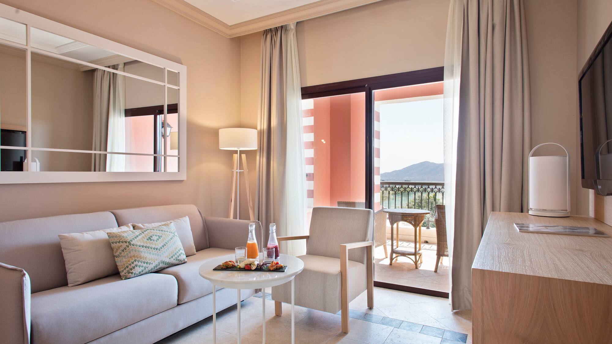 a living room with a couch and a table