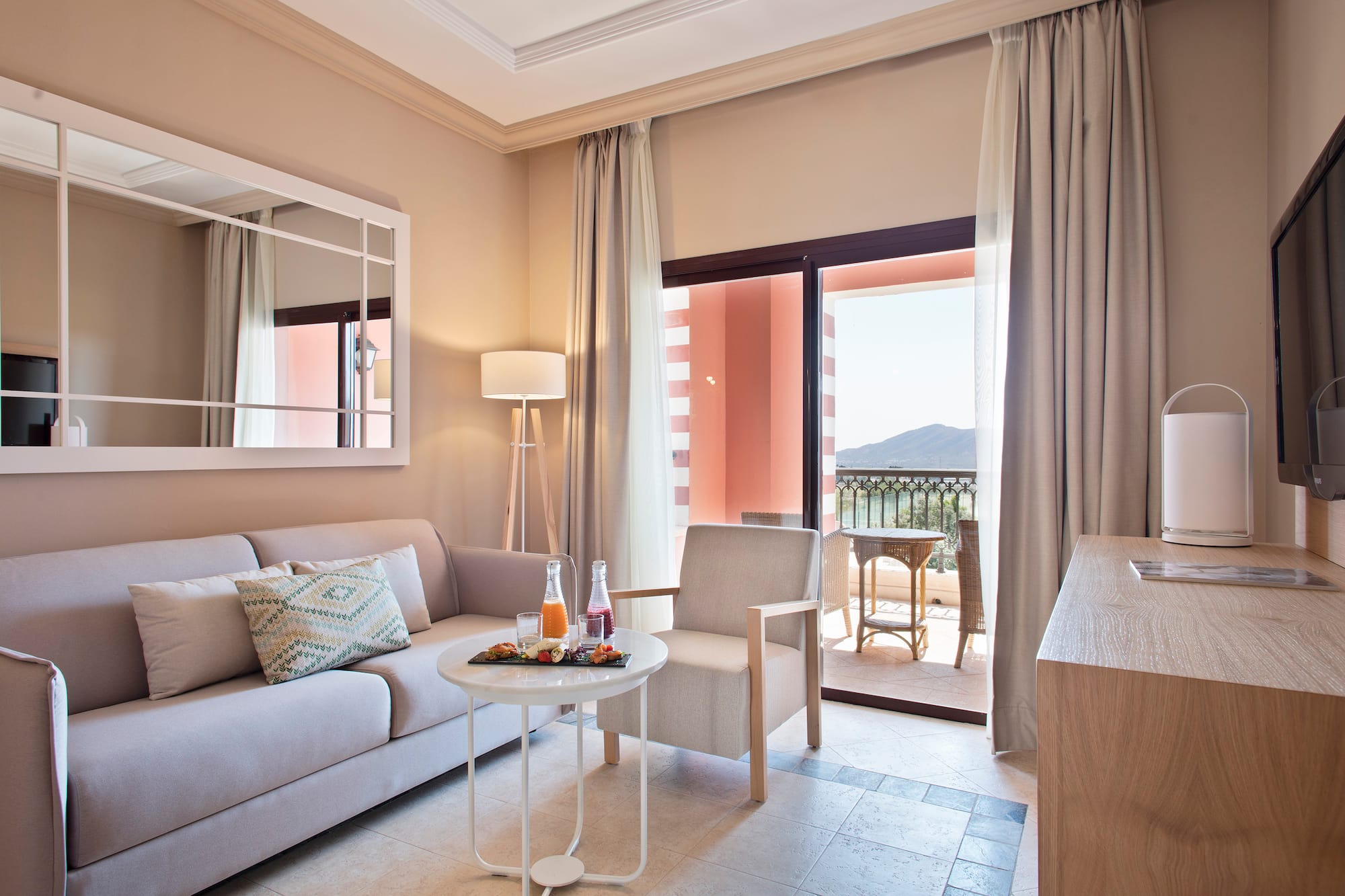 a living room with a couch and a table