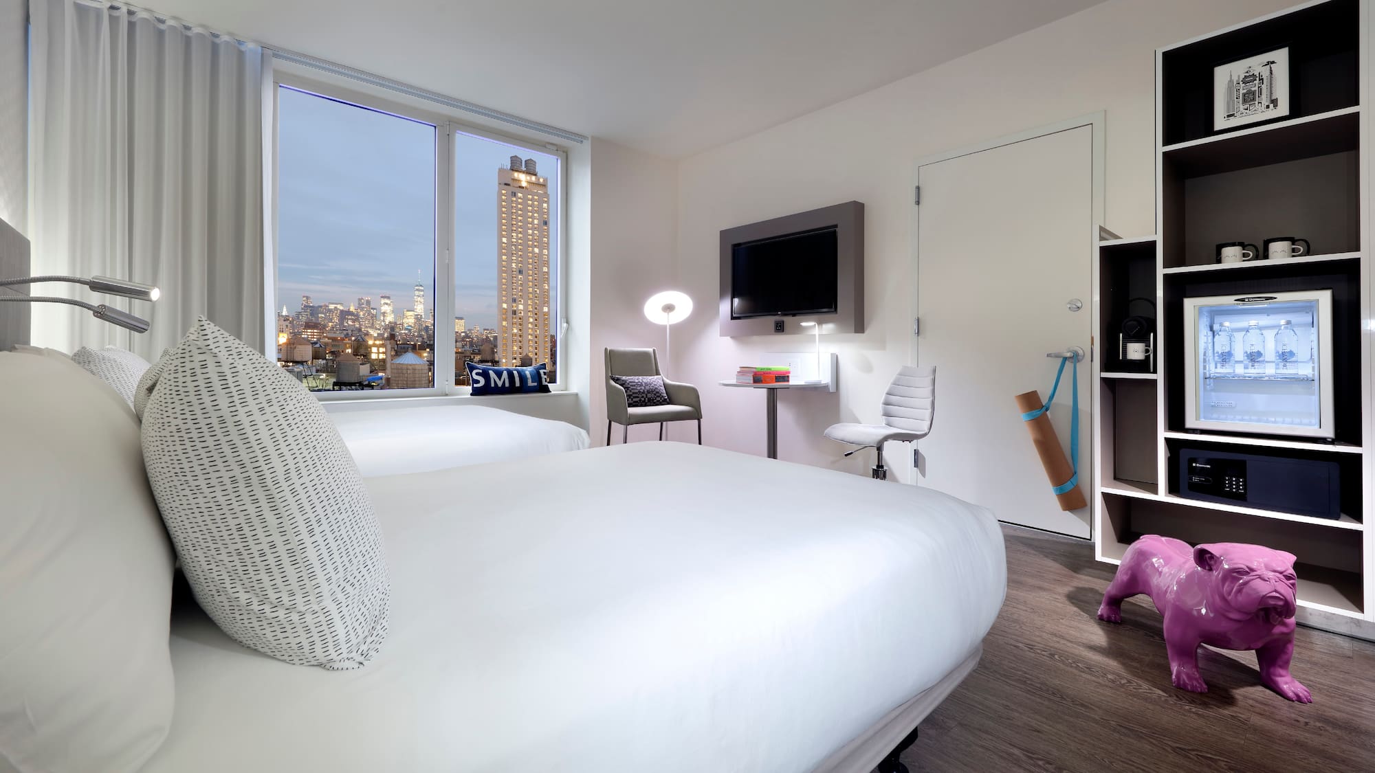 a room with a bed and a window