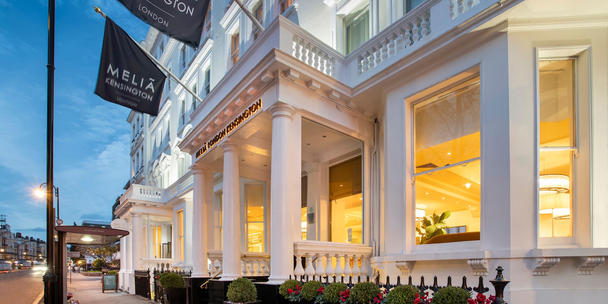 a building with flags in front of it