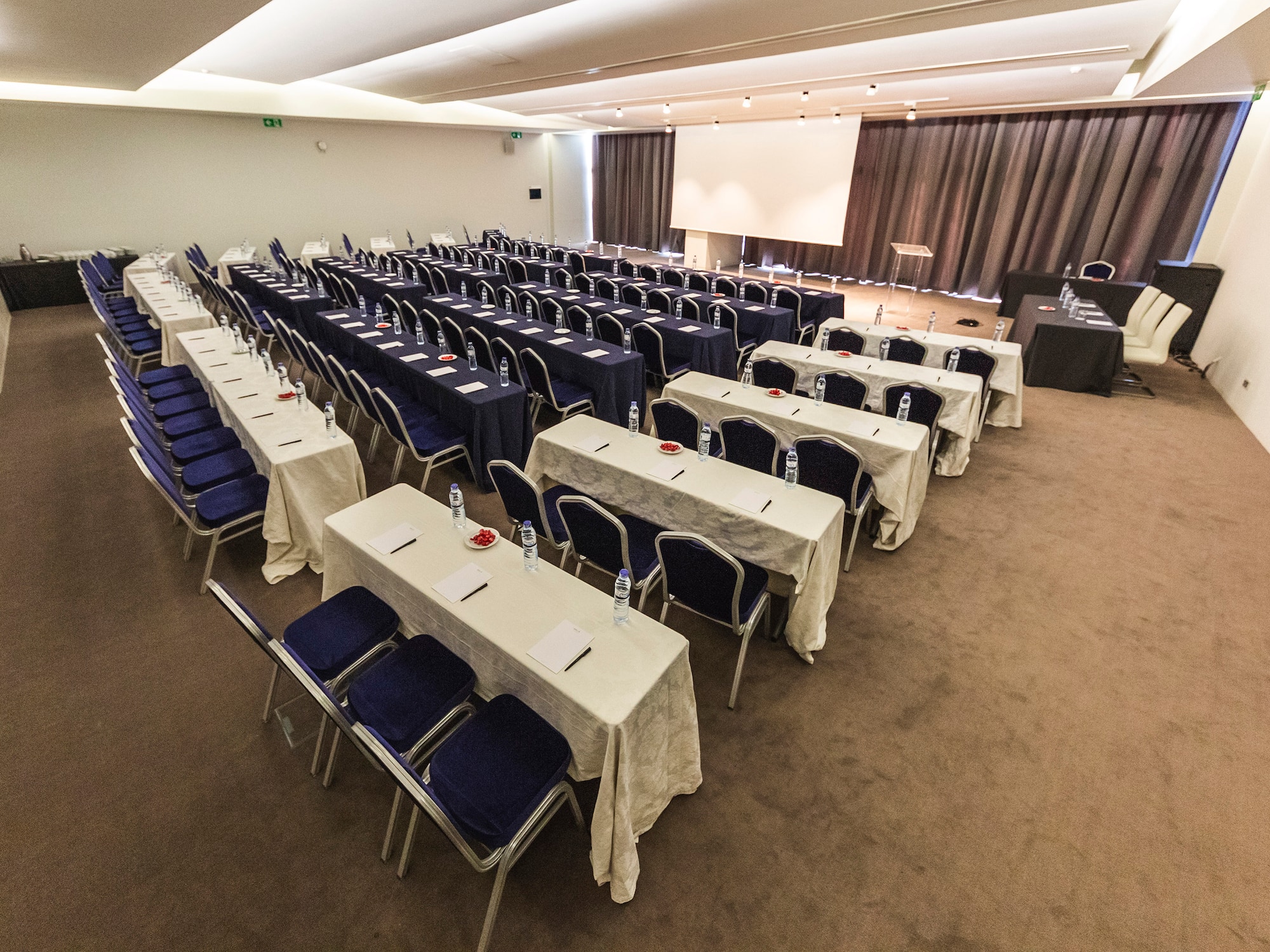 a room with tables and chairs