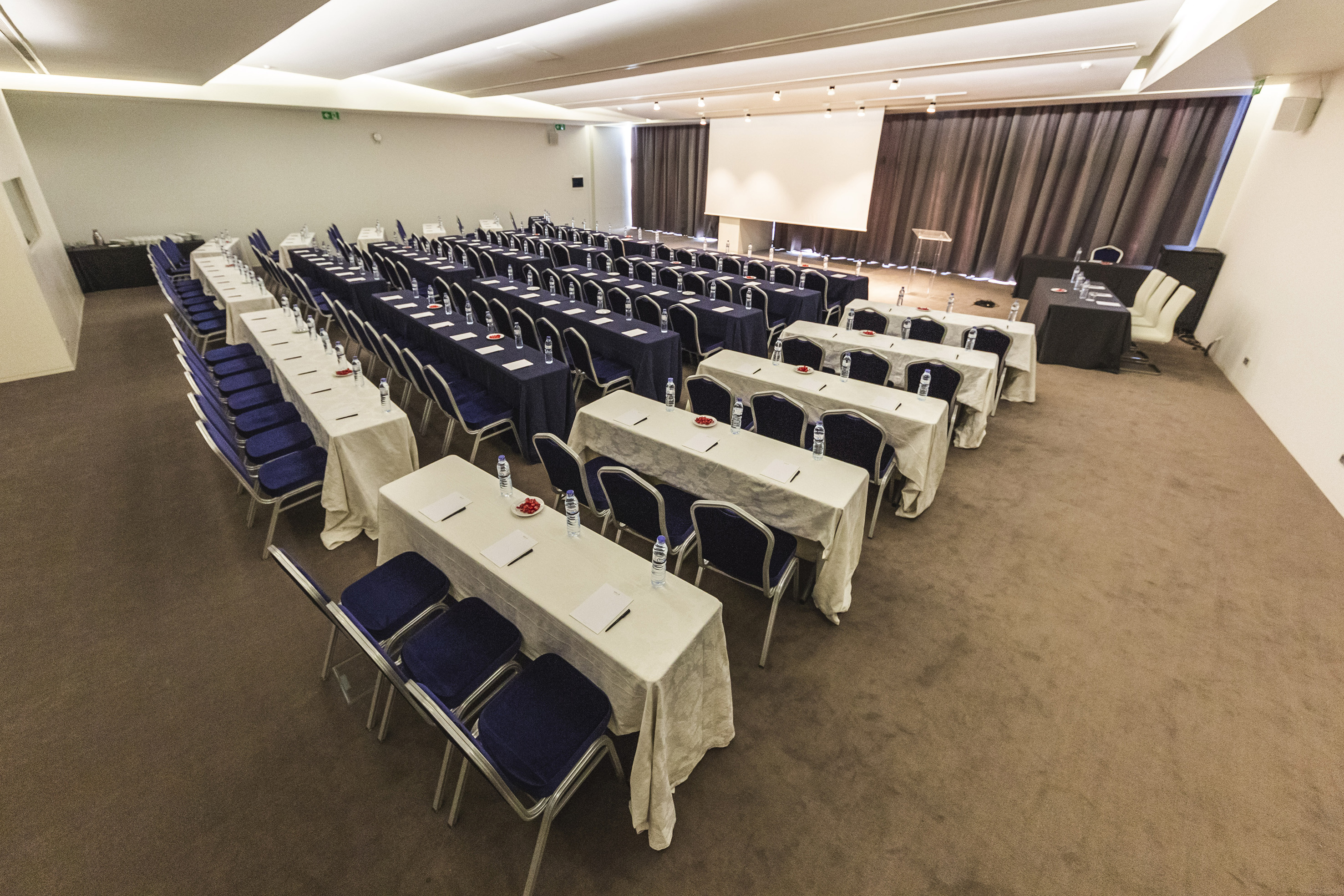 a room with tables and chairs