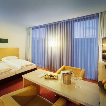 a room with a bed and a table