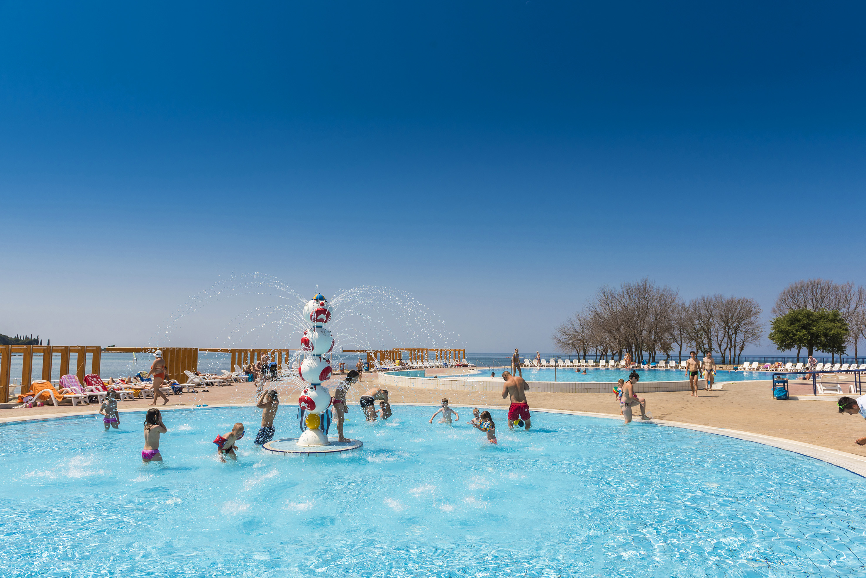 a group of people in a pool