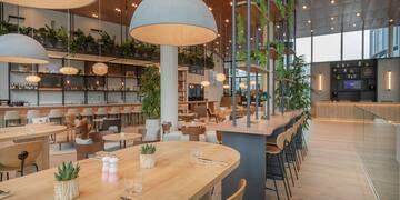 a large room with tables and chairs