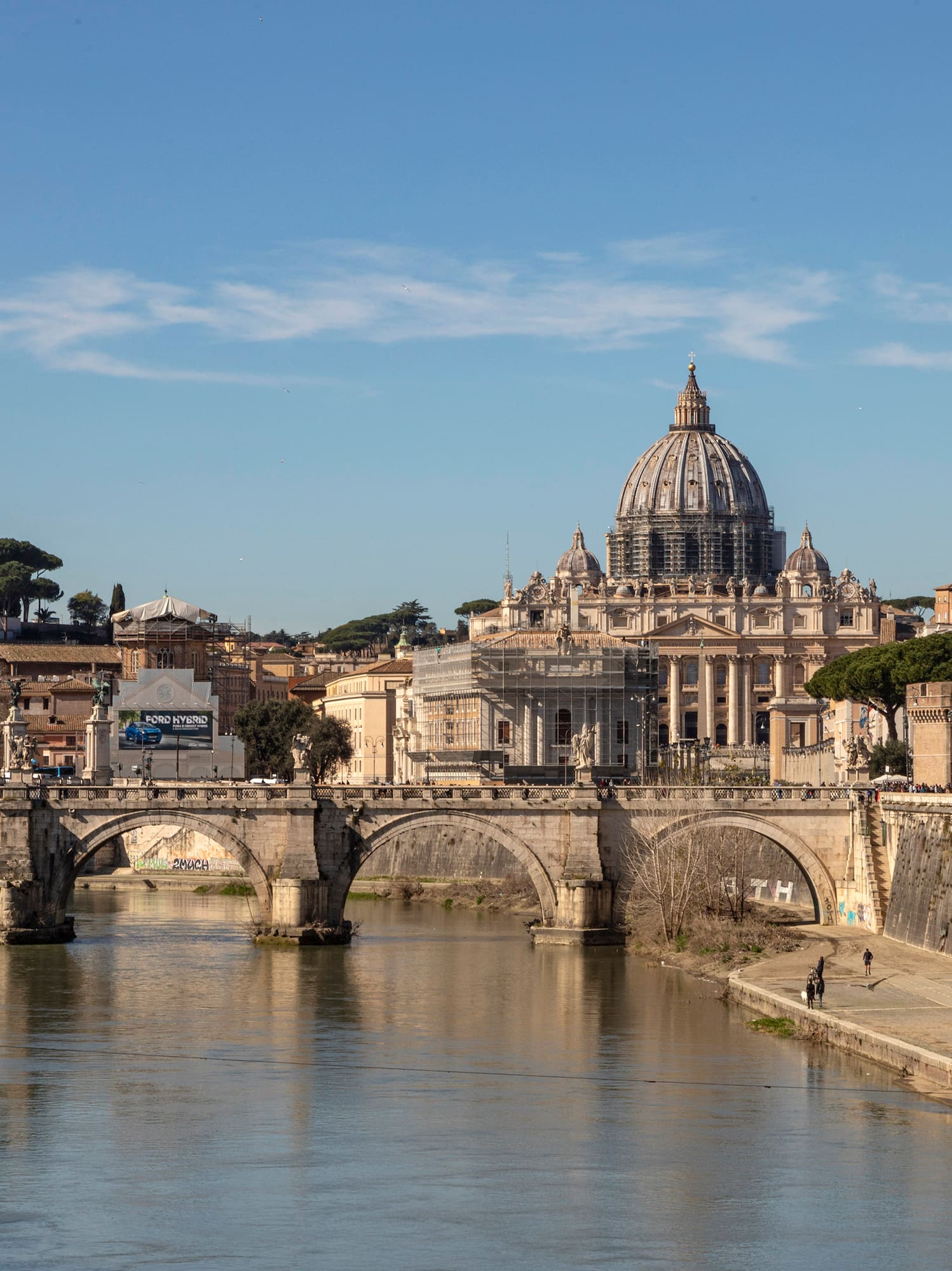 Tiber over a river with a large building in the background