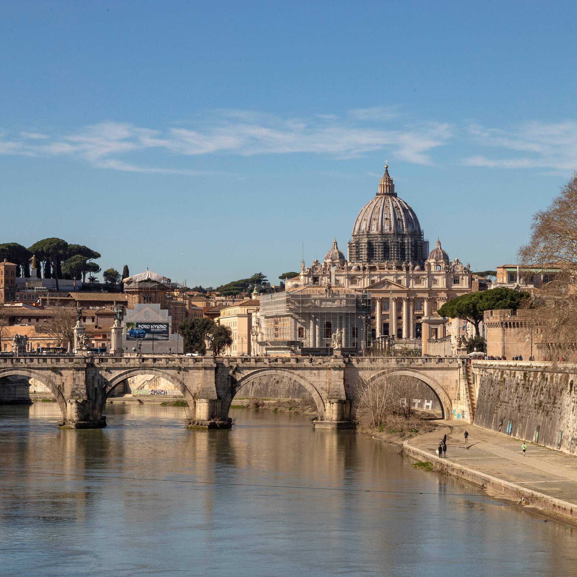Tiber over a river with a large building in the background