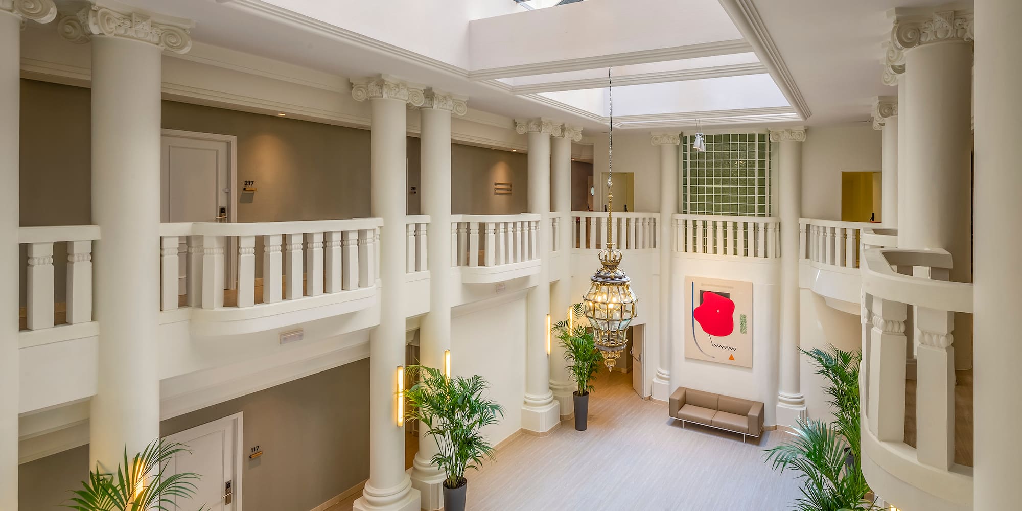 a large white building with a skylight