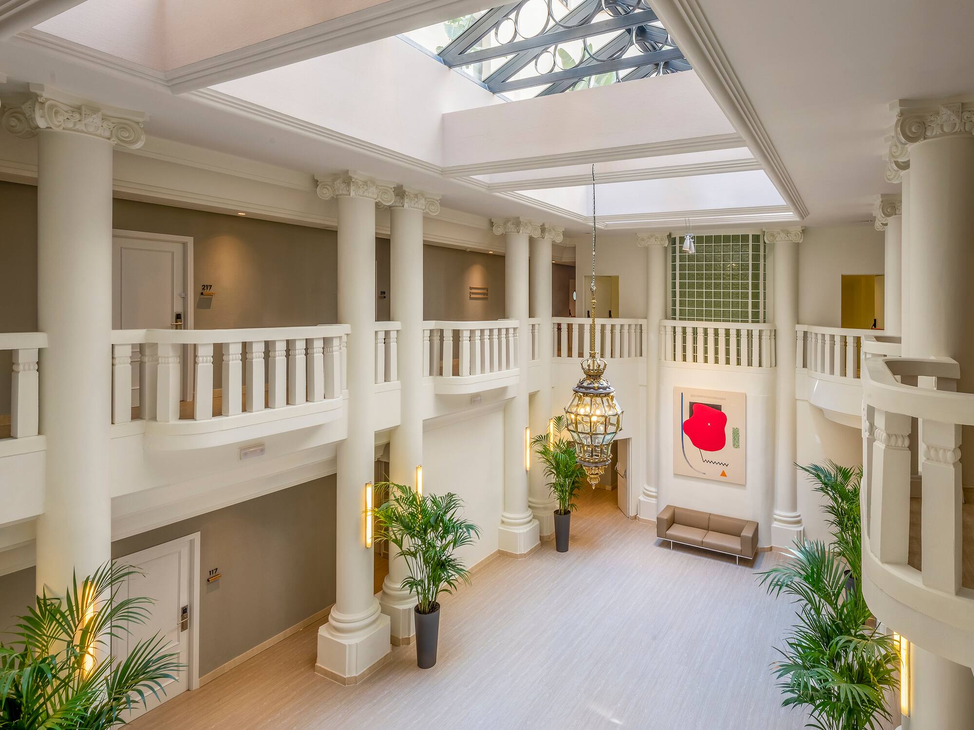 a large white building with a skylight