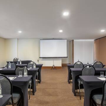 a room with tables and chairs