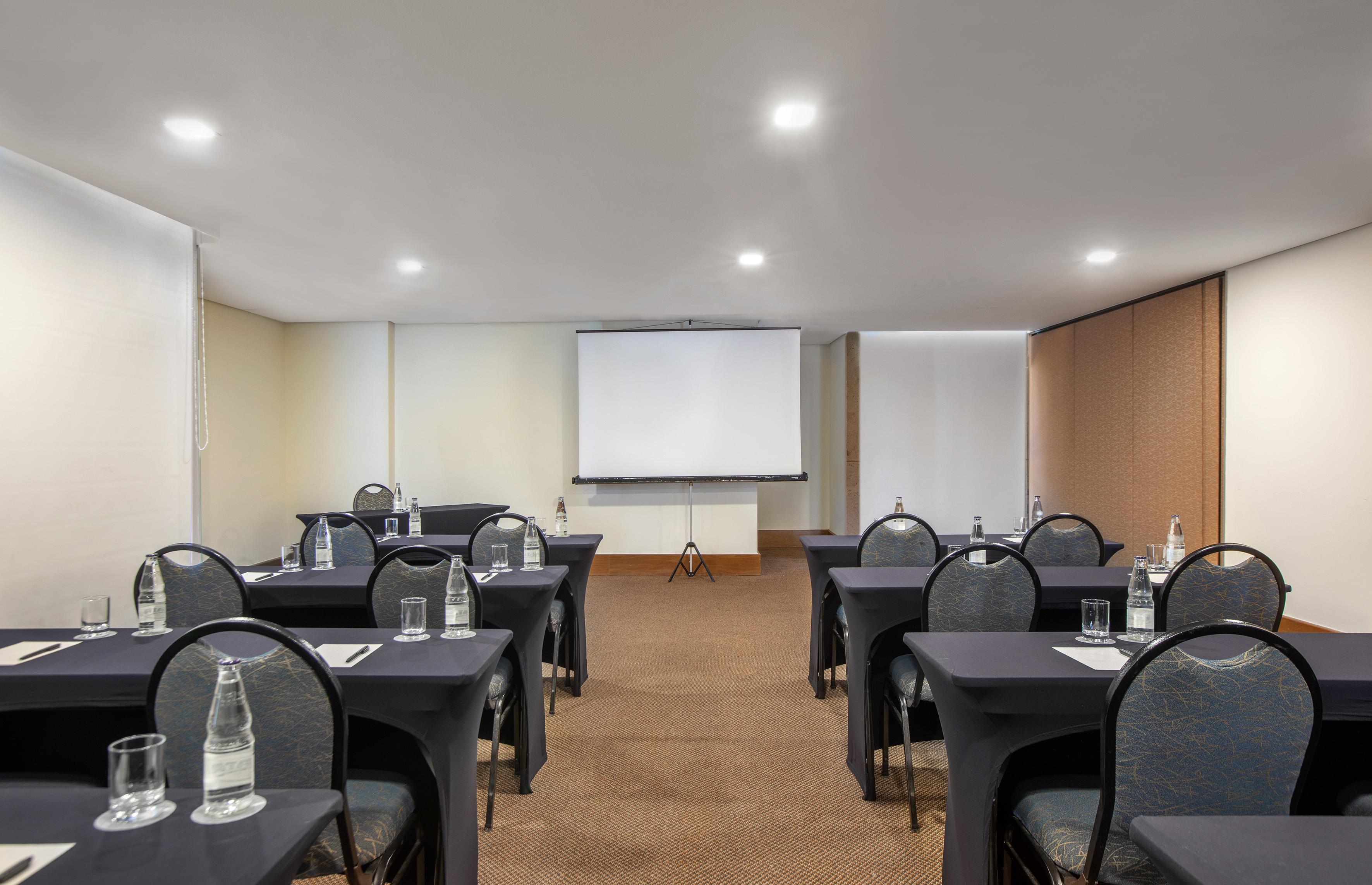 a room with tables and chairs