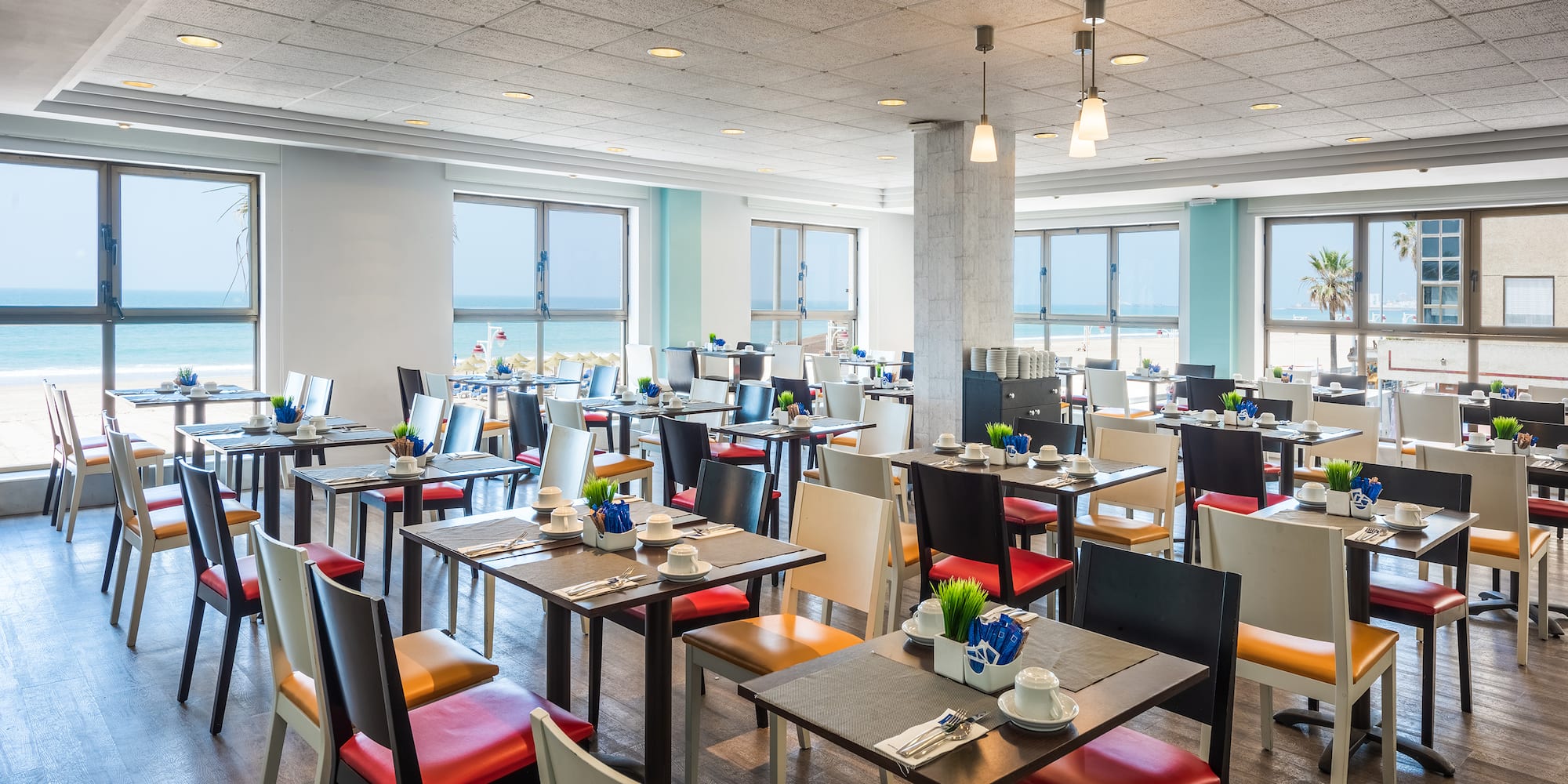 a room with tables and chairs