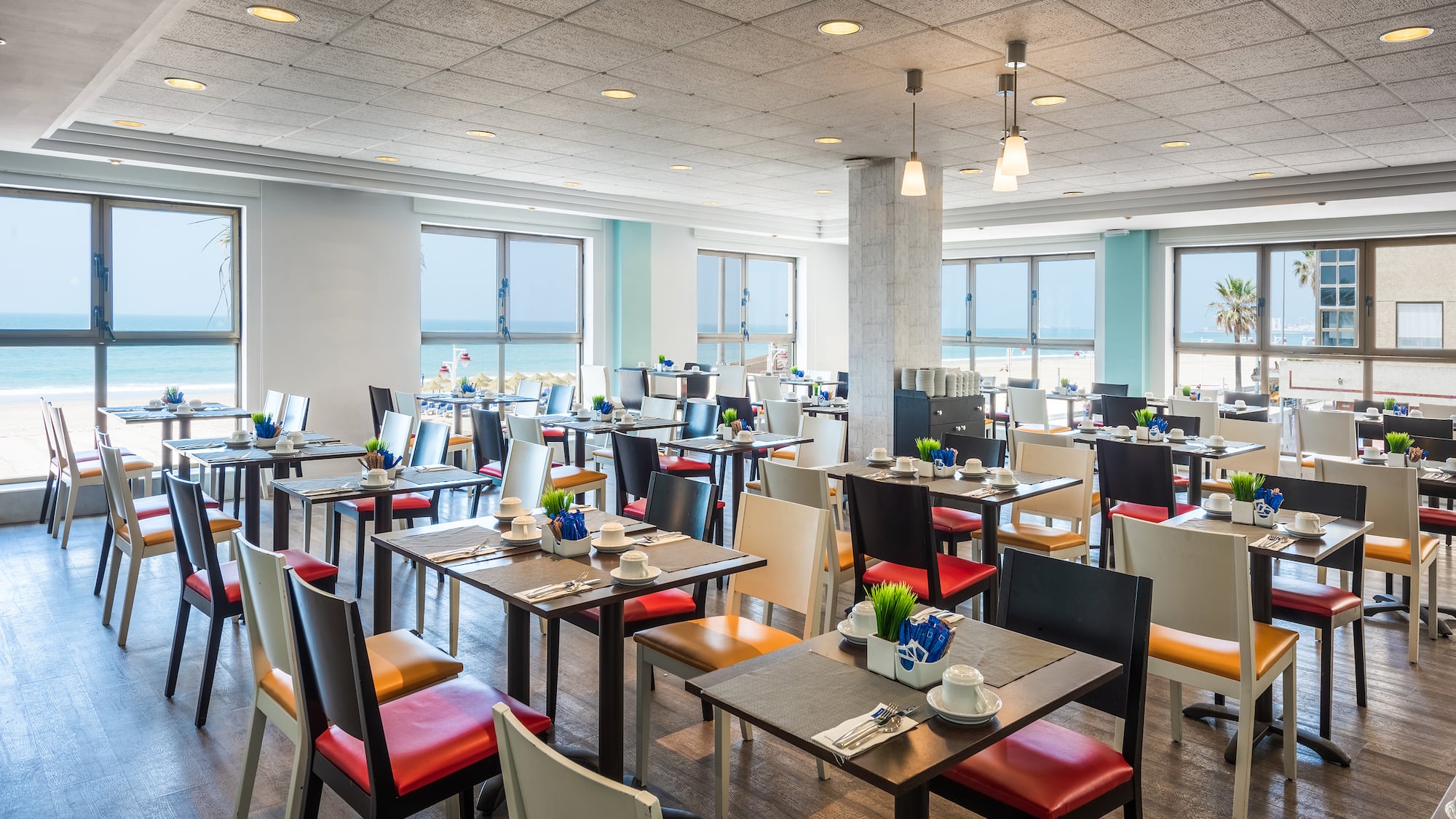 a room with tables and chairs