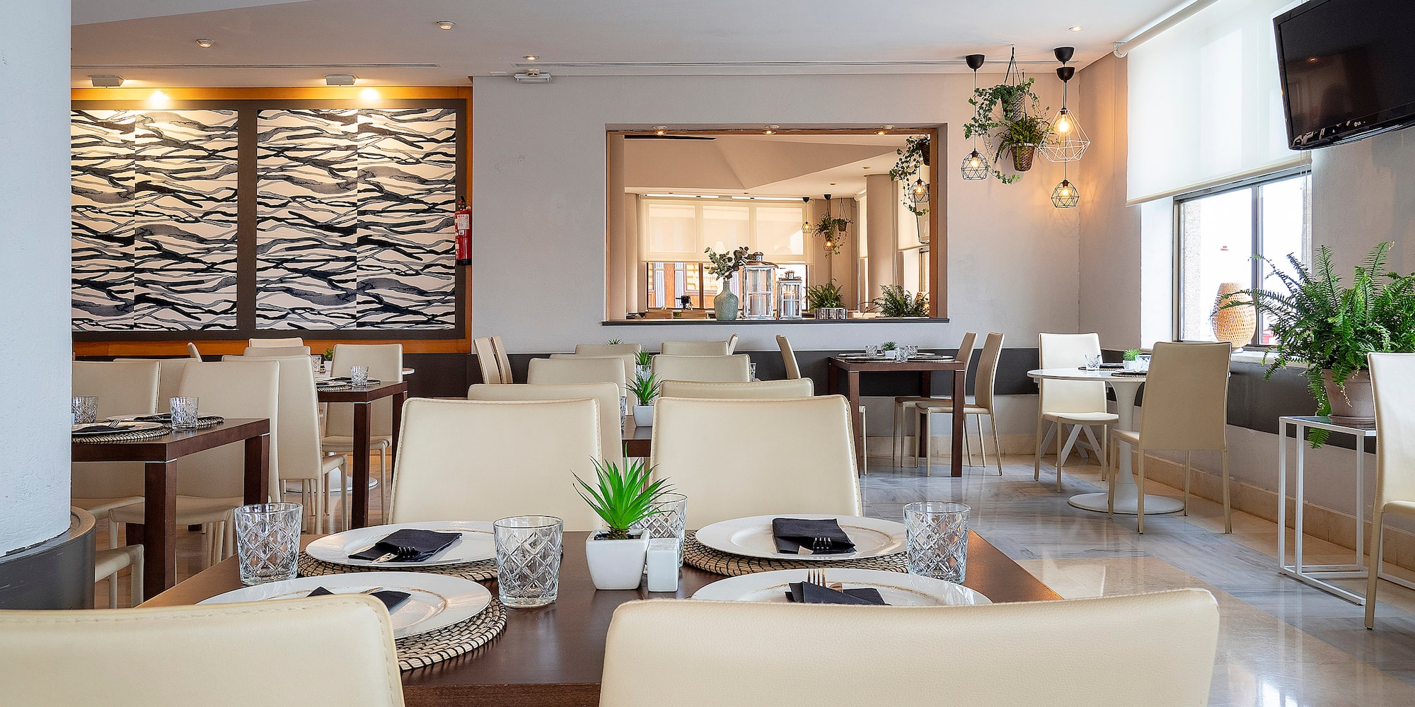 a room with tables and chairs