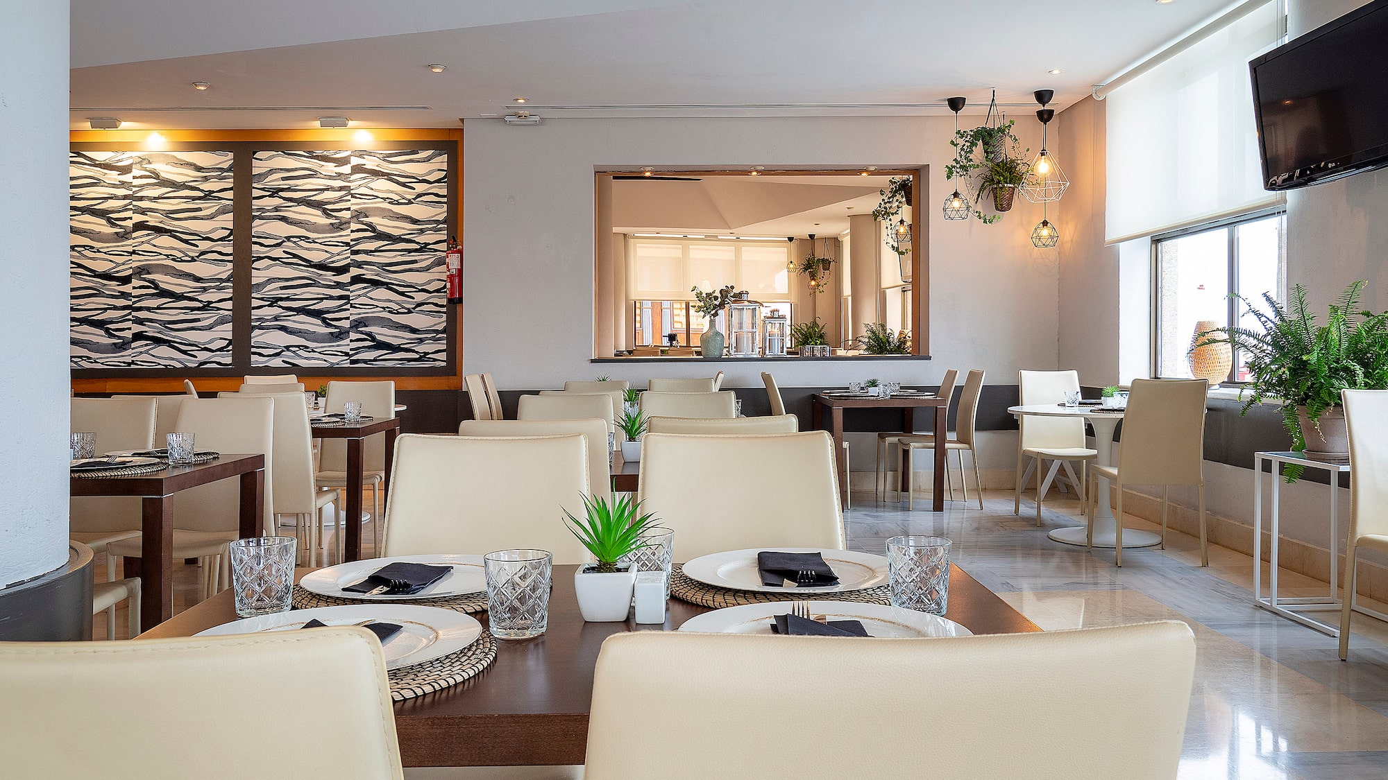 a room with tables and chairs