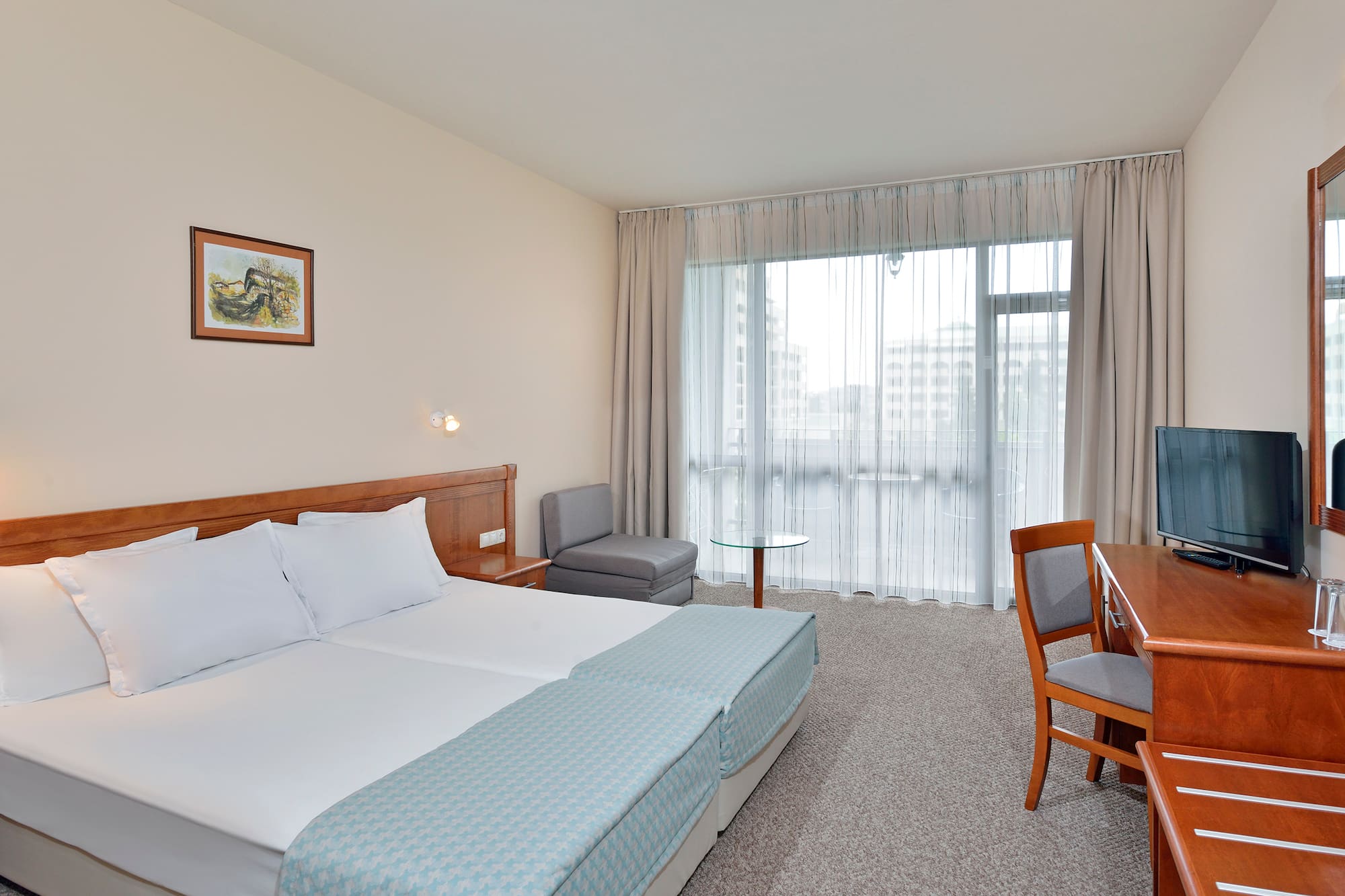 a room with a bed and a table