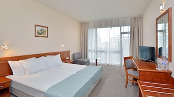 a room with a bed and a table