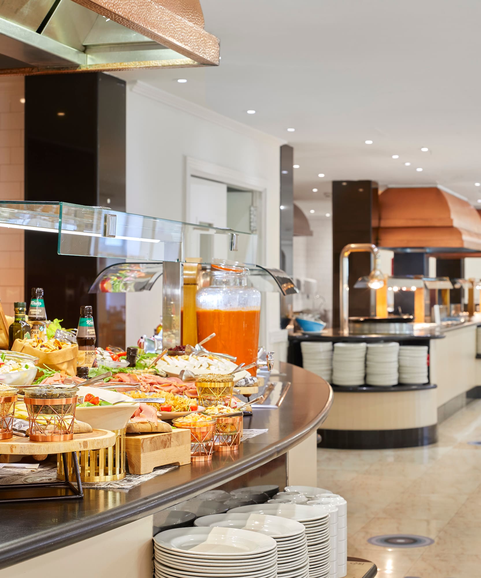 a buffet line with food on it