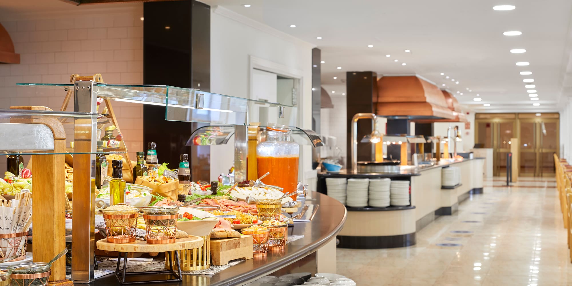 a buffet line with food on it