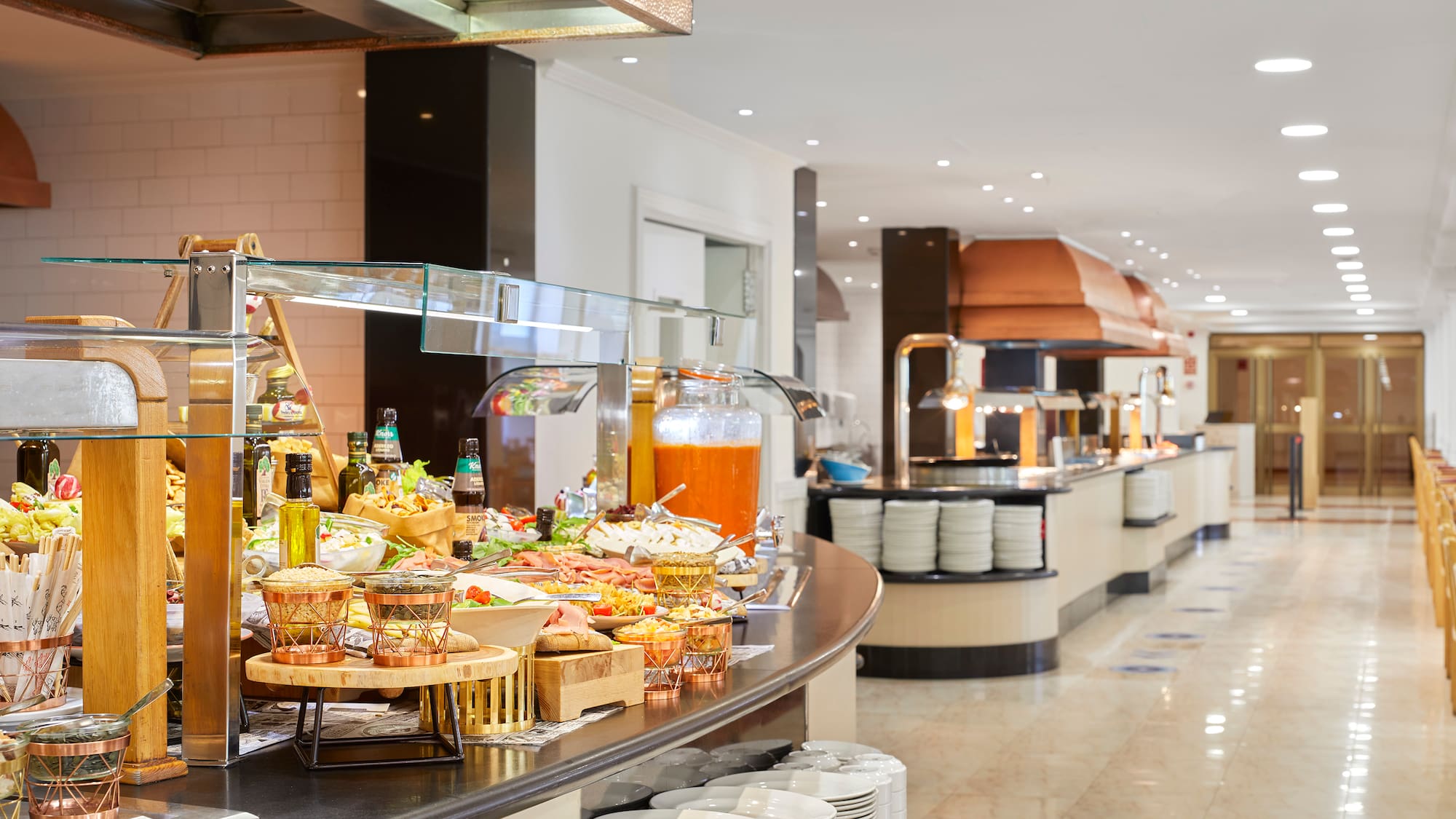 a buffet line with food on it