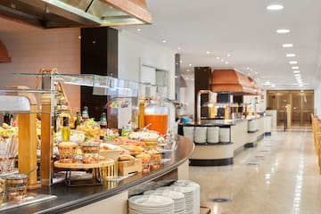 a buffet line with food on it