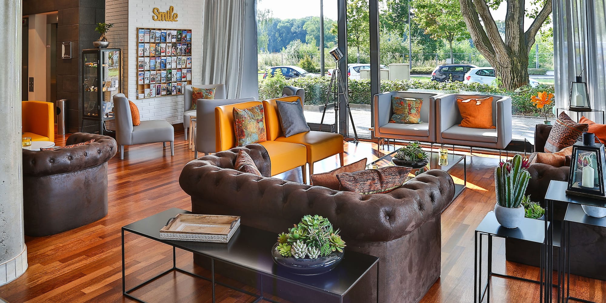 a room with couches and tables