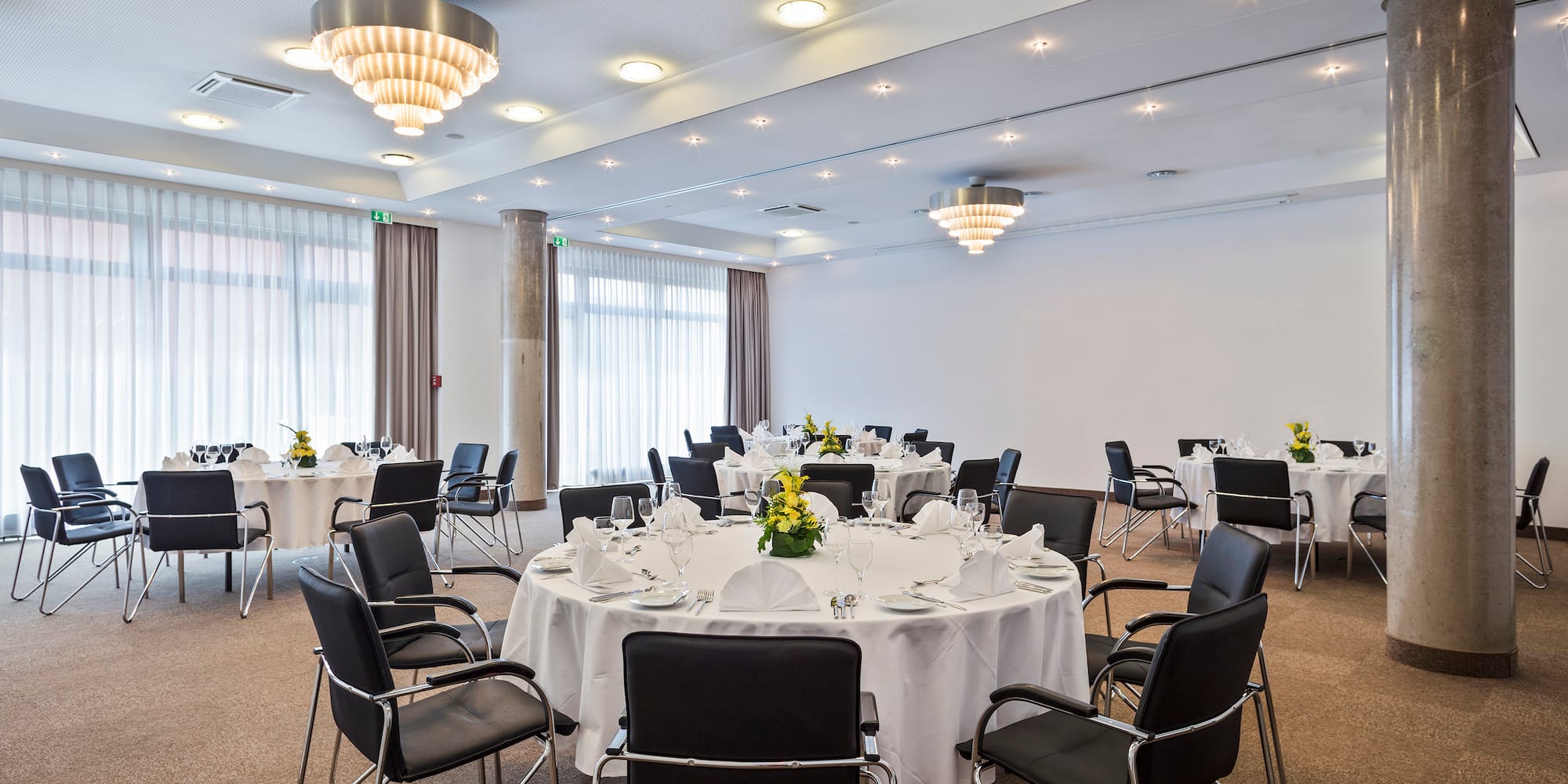 a room with tables and chairs