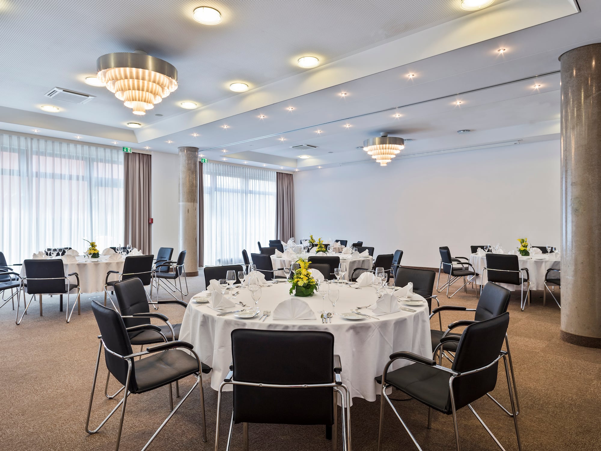 a room with tables and chairs