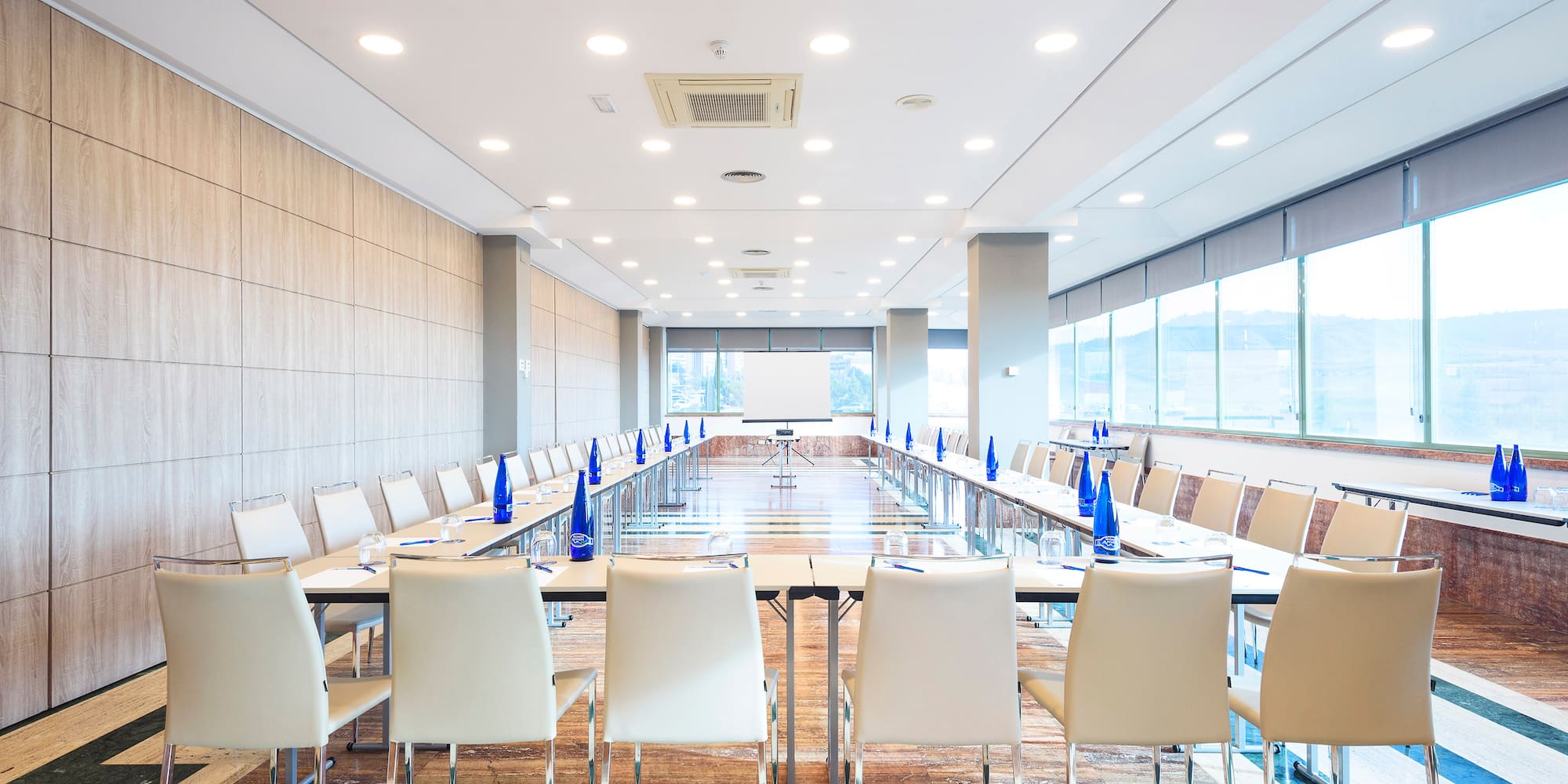 a room with tables and chairs