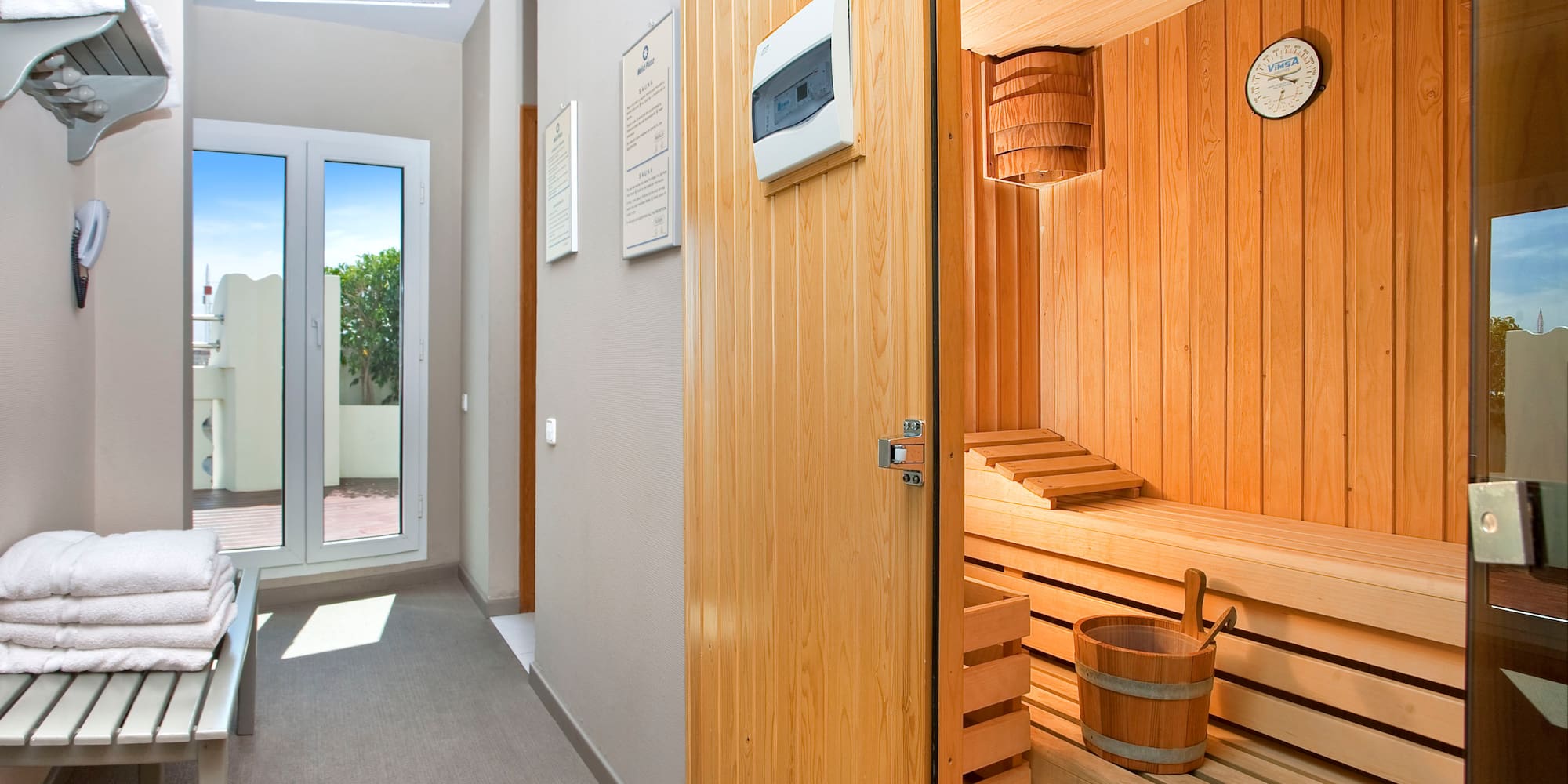 a room with a wooden sauna