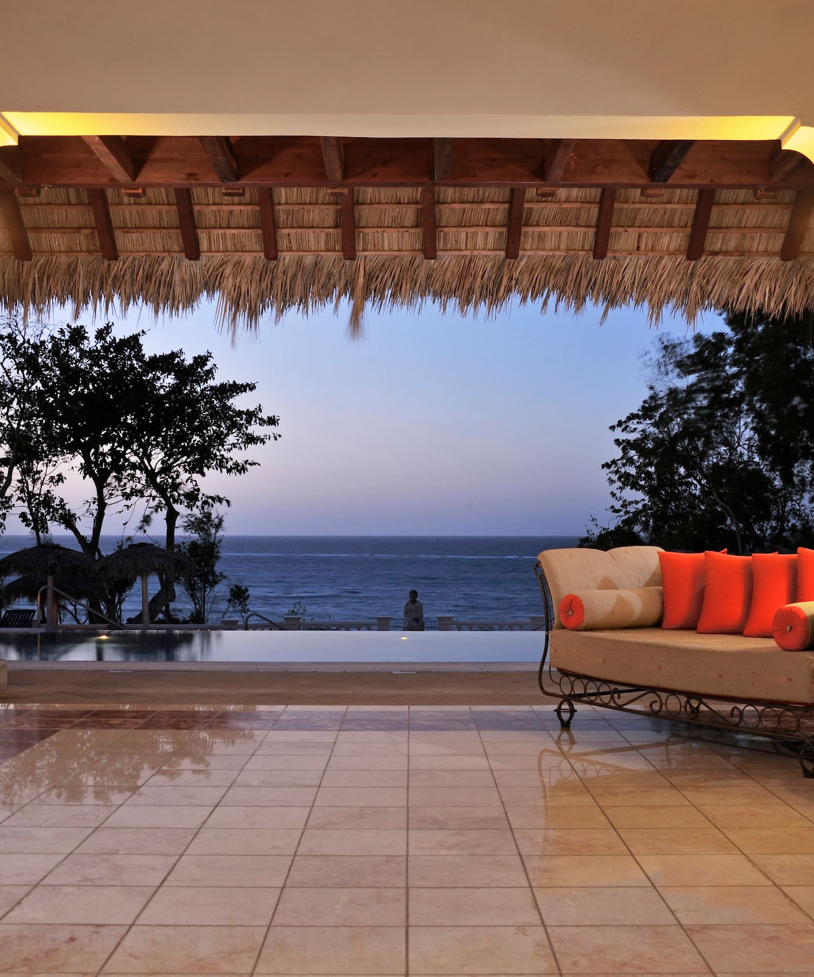 a couch and a pool in a room