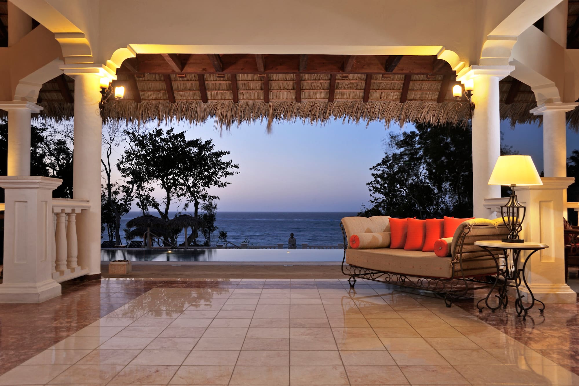 a couch and a pool in a room