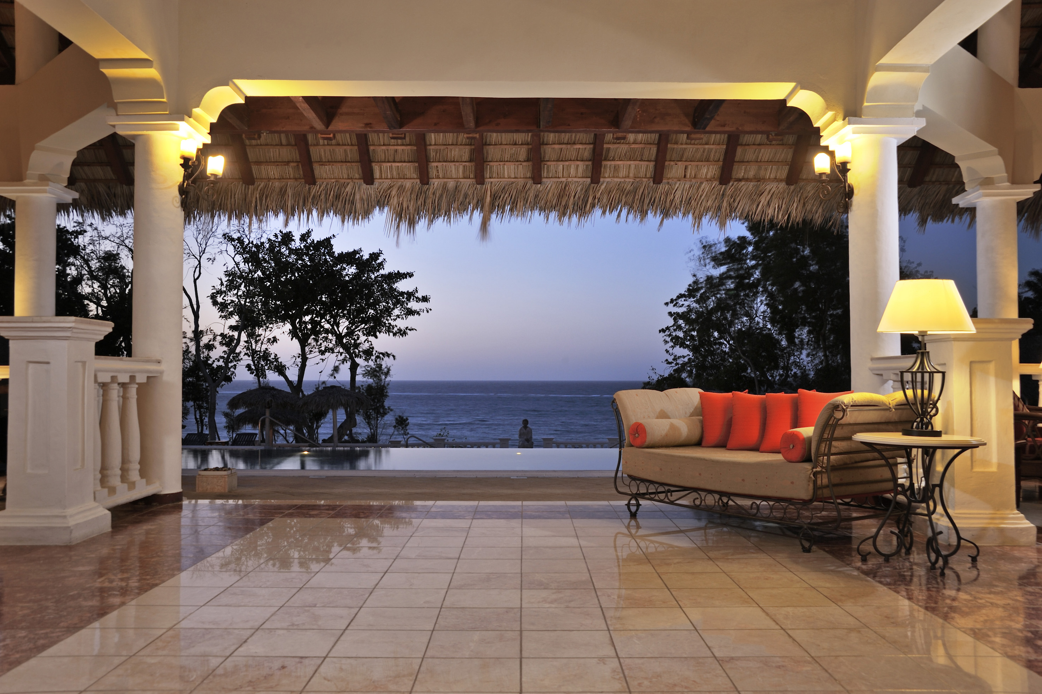 a couch and a pool in a room