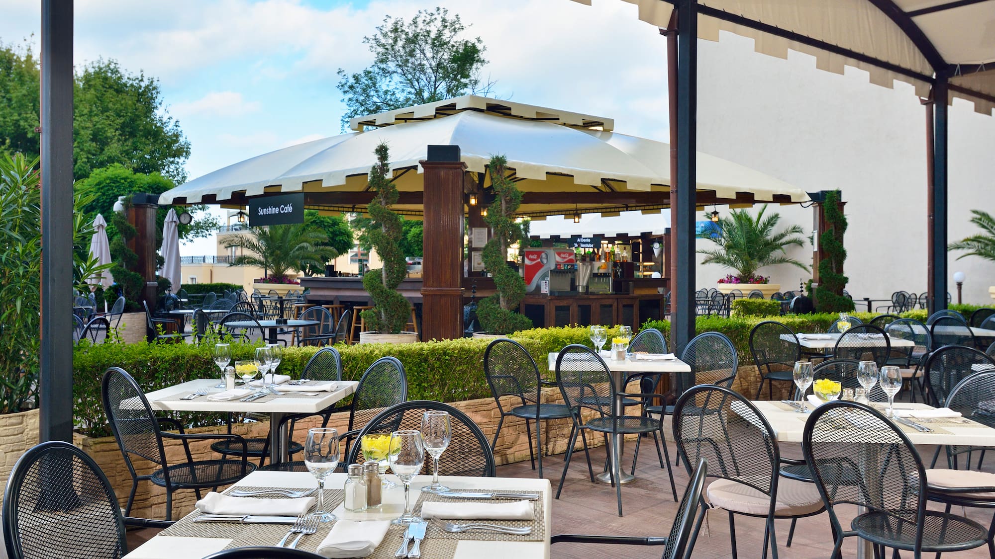 a restaurant with tables and chairs