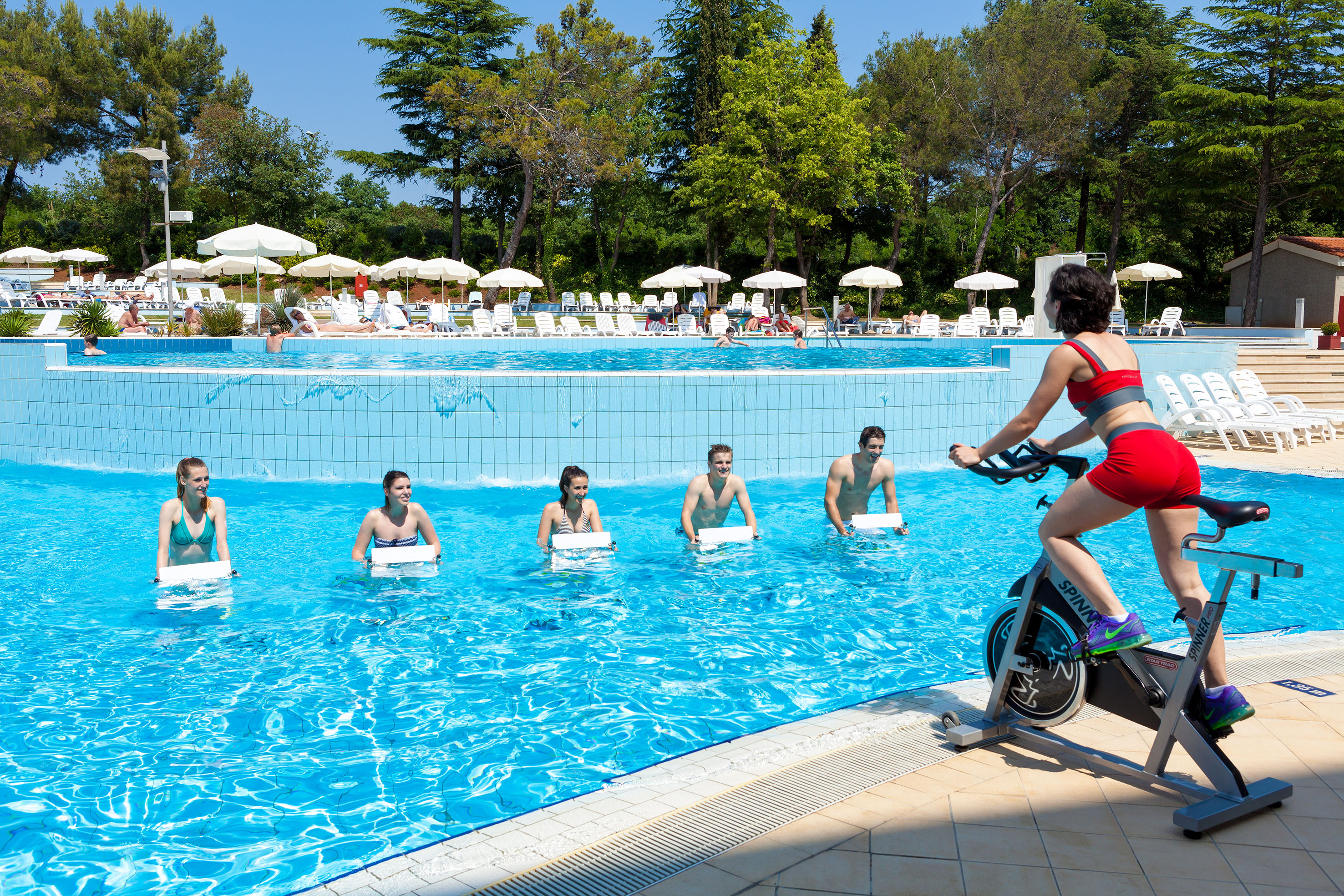 a group of people in a pool